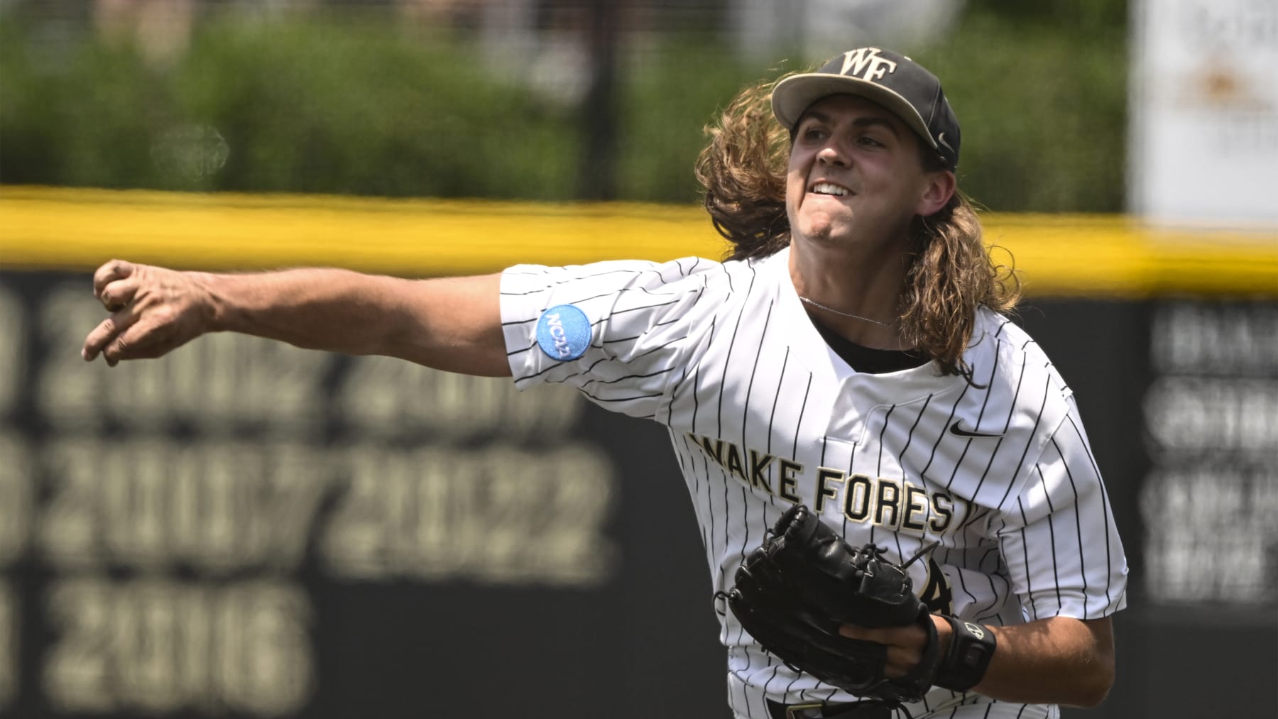 Wake Forest pitcher Rhett Lowder (4) throws a pitch during the second inning of an NCAA college baseball tournament super regional game against Alabama on Saturday, June 10, 2023, in Winston-Salem, N.C. (AP Photo/Matt Kelley)
