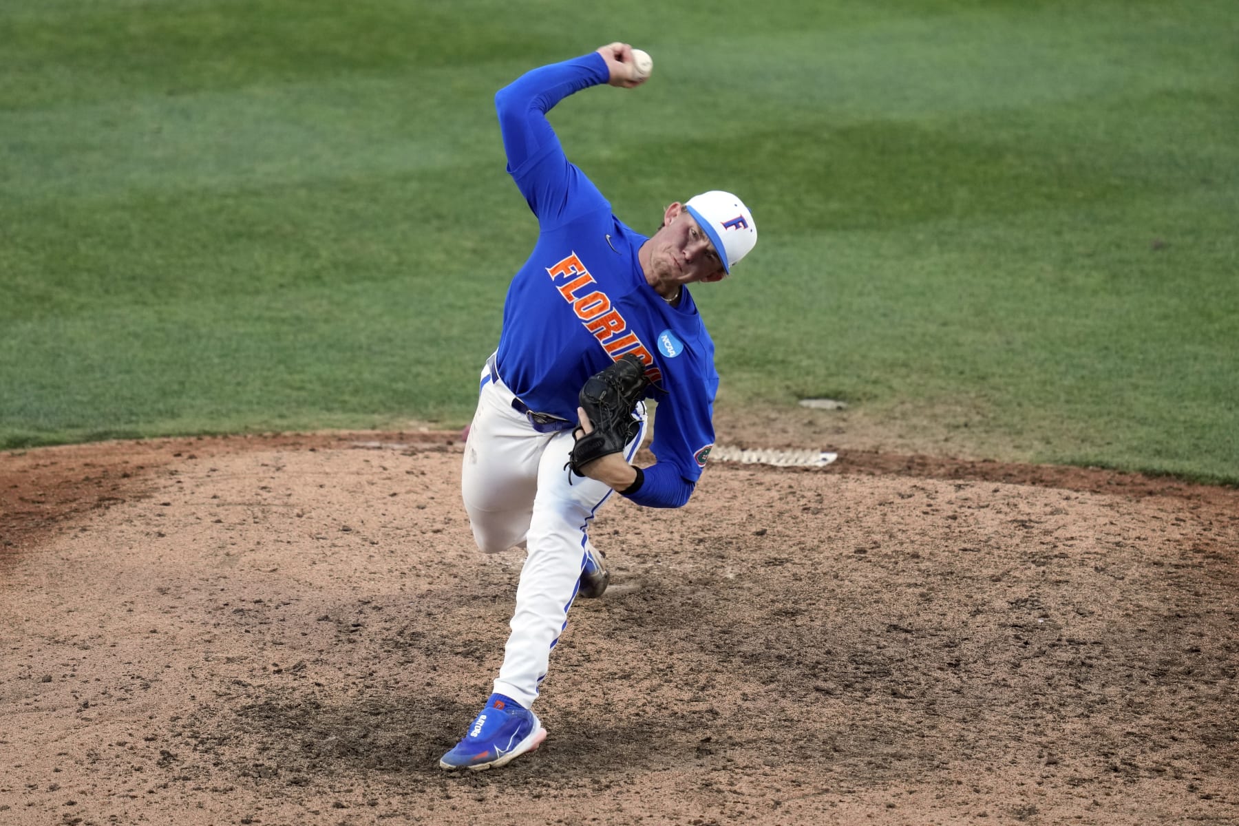 Florida's Hurston Waldrep pitches against South Carolina in the ninth inning of an NCAA college baseball tournament super regional game Saturday, June 10, 2023, in Gainesville, Fla. (AP Photo/John Raoux)