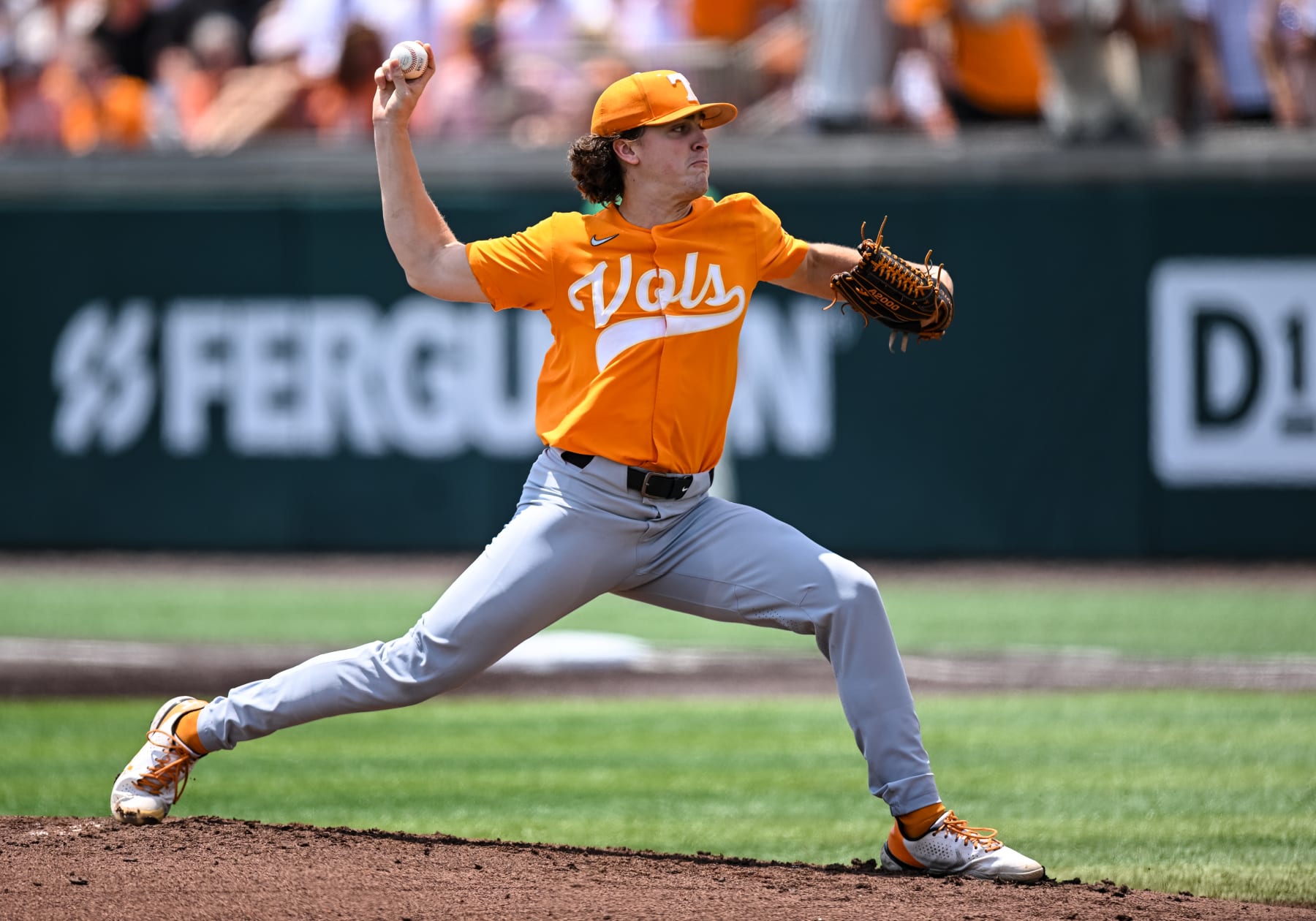KNOXVILLE, TN - JUNE 11: Tennessee pitcher Chase Dollander (11) pitching during game two of the NCAA Super Regionals between the Tennessee Volunteers and Notre Dame Fighting Irish on June 11, 2022, at Lindsey Nelson Stadium in Knoxville, TN. (Photo by Bryan Lynn/Icon Sportswire via Getty Images)