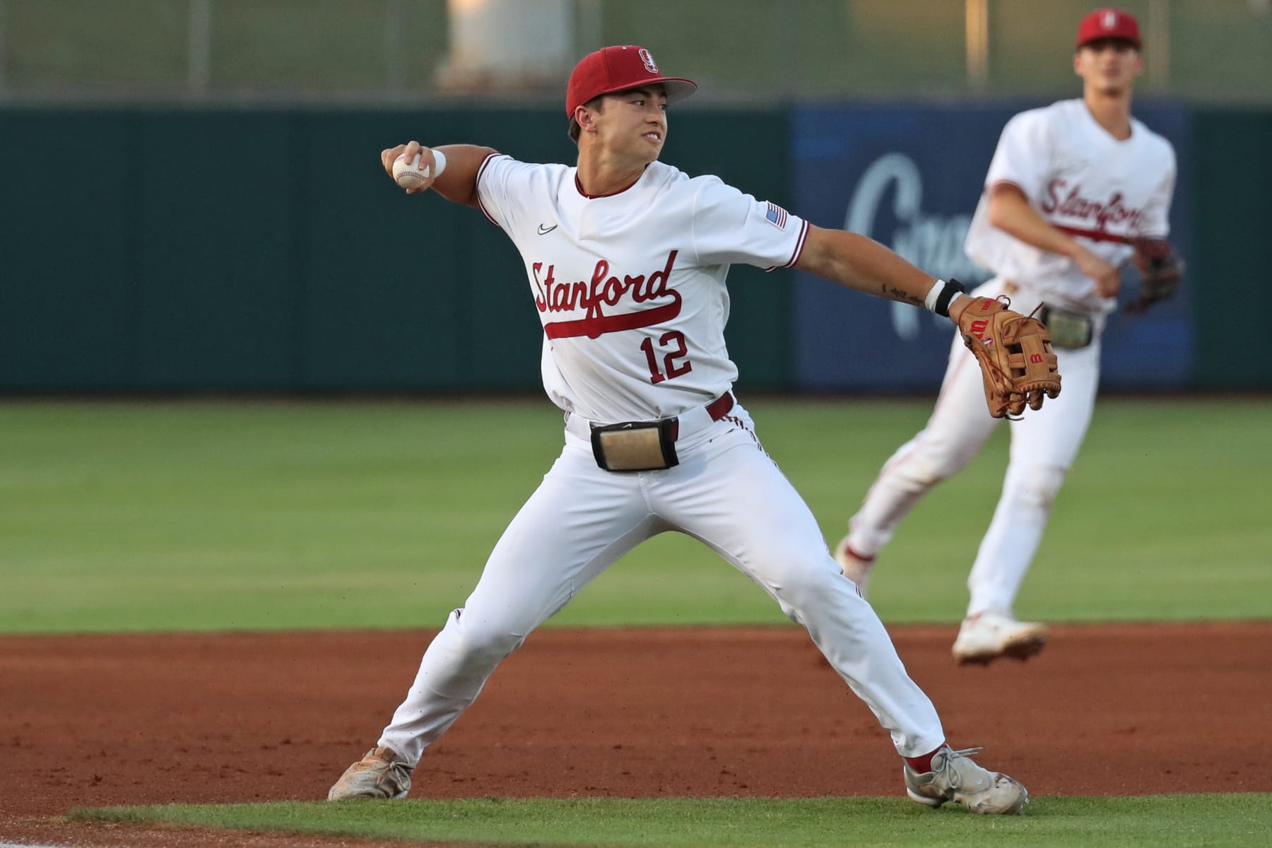 SCOTTSDALE, AZ - MAY 26: Stanford infielder Tommy Troy (12) makes a throw to first base during a Pac-12 Baseball Tournament game between the Arizona Wildcats and the Stanford Cardinal on May 26th, 2023, at Scottsdale Stadium in Scottsdale, AZ. (Photo by Zac BonDurant/Icon Sportswire via Getty Images)