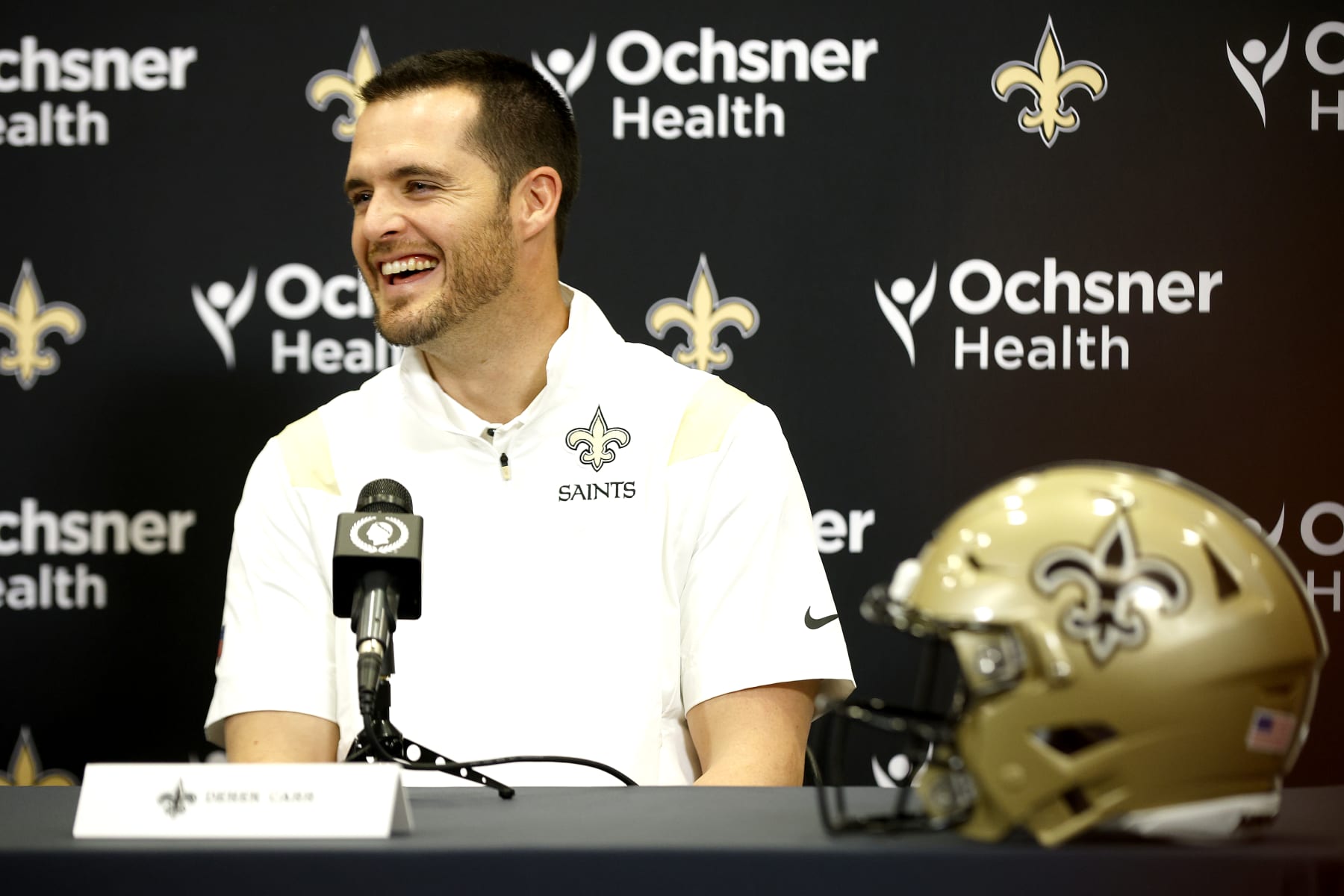 NEW ORLEANS, LOUISIANA - MARCH 11:  Quarterback Derek Carr of the New Orleans Saints speaks to members of the media after signing a four-year contract with the Saints at New Orleans Saints Indoor Practice Facility on March 11, 2023 in New Orleans, Louisiana.  (Photo by Sean Gardner/Getty Images)