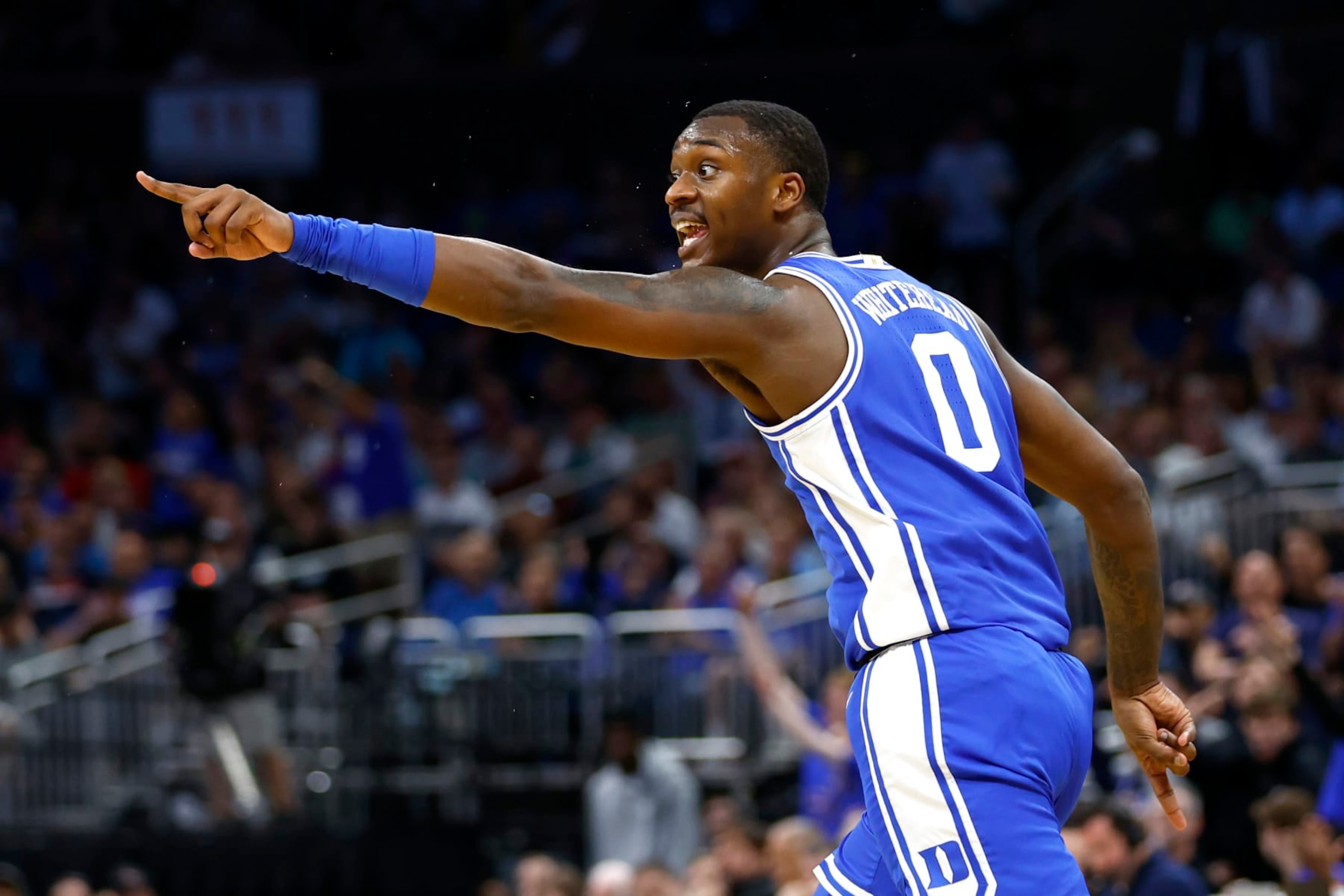 ORLANDO, FLORIDA - MARCH 18: Dariq Whitehead #0 of the Duke Blue Devils celebrates after making a three point basket against the Tennessee Volunteers during the first half in the second round of the NCAA Men's Basketball Tournament at Amway Center on March 18, 2023 in Orlando, Florida. (Photo by Kevin Sabitus/Getty Images)