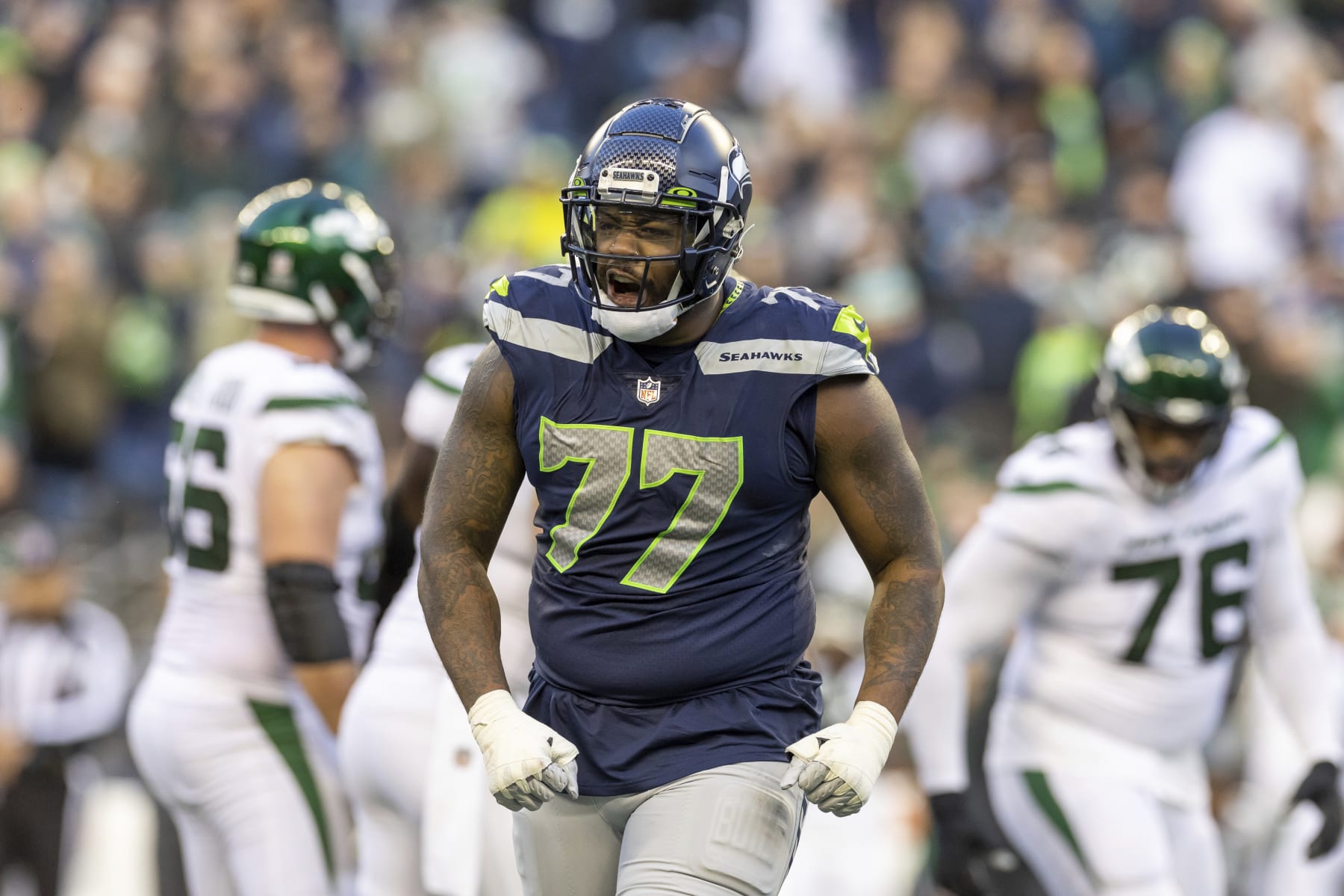 Seattle Seahawks defensive end Quinton Jefferson (77) reacts after a sack against the New York Jets in an NFL football game, Sunday, Jan. 1, 2023, in Seattle, Wash. Seahawks won 23-6. (AP Photo/Jeff Lewis)