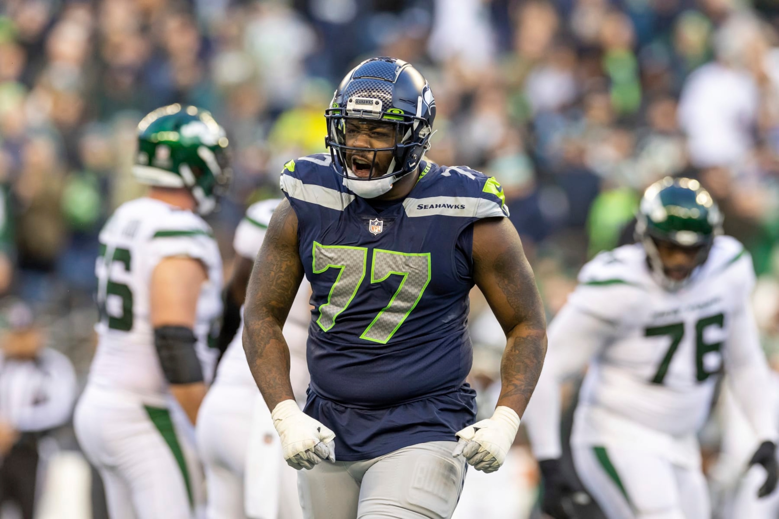 Seattle Seahawks defensive end Quinton Jefferson (77) reacts after a sack against the New York Jets in an NFL football game, Sunday, Jan. 1, 2023, in Seattle, Wash. Seahawks won 23-6. (AP Photo/Jeff Lewis)