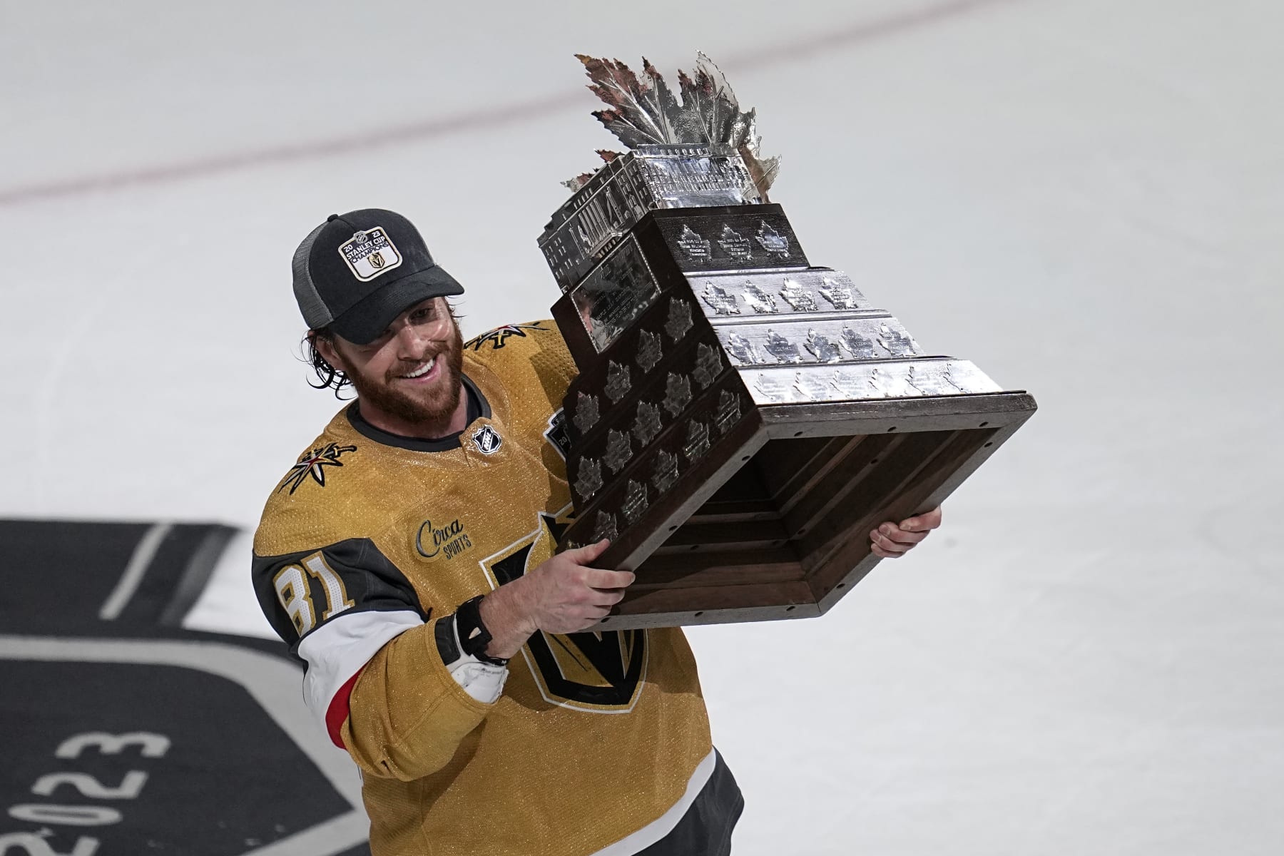 Vegas Golden Knights right wing Jonathan Marchessault hold the Conn Smythe Trophy after the Knights defeated the Florida Panthers 9-3 in Game 5 of the NHL hockey Stanley Cup Finals against the Florida Panthers Tuesday, June 13, 2023, in Las Vegas. The Knights won the series 4-1. (AP Photo/Abbie Parr)