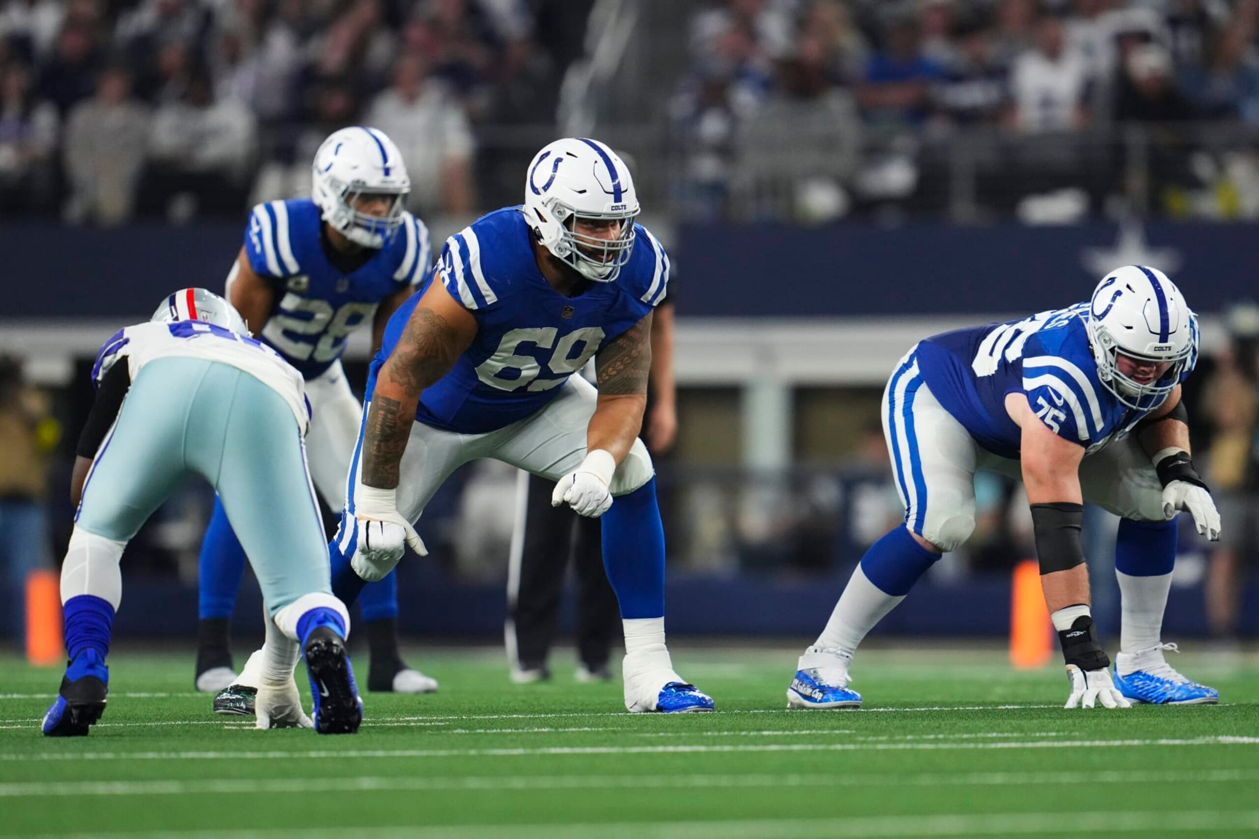 ARLINGTON, TX - DECEMBER 04: Matt Pryor #69 of the Indianapolis Colts gets set against the Dallas Cowboys at AT&T Stadium on December 4, 2022 in Arlington, Texas. (Photo by Cooper Neill/Getty Images)