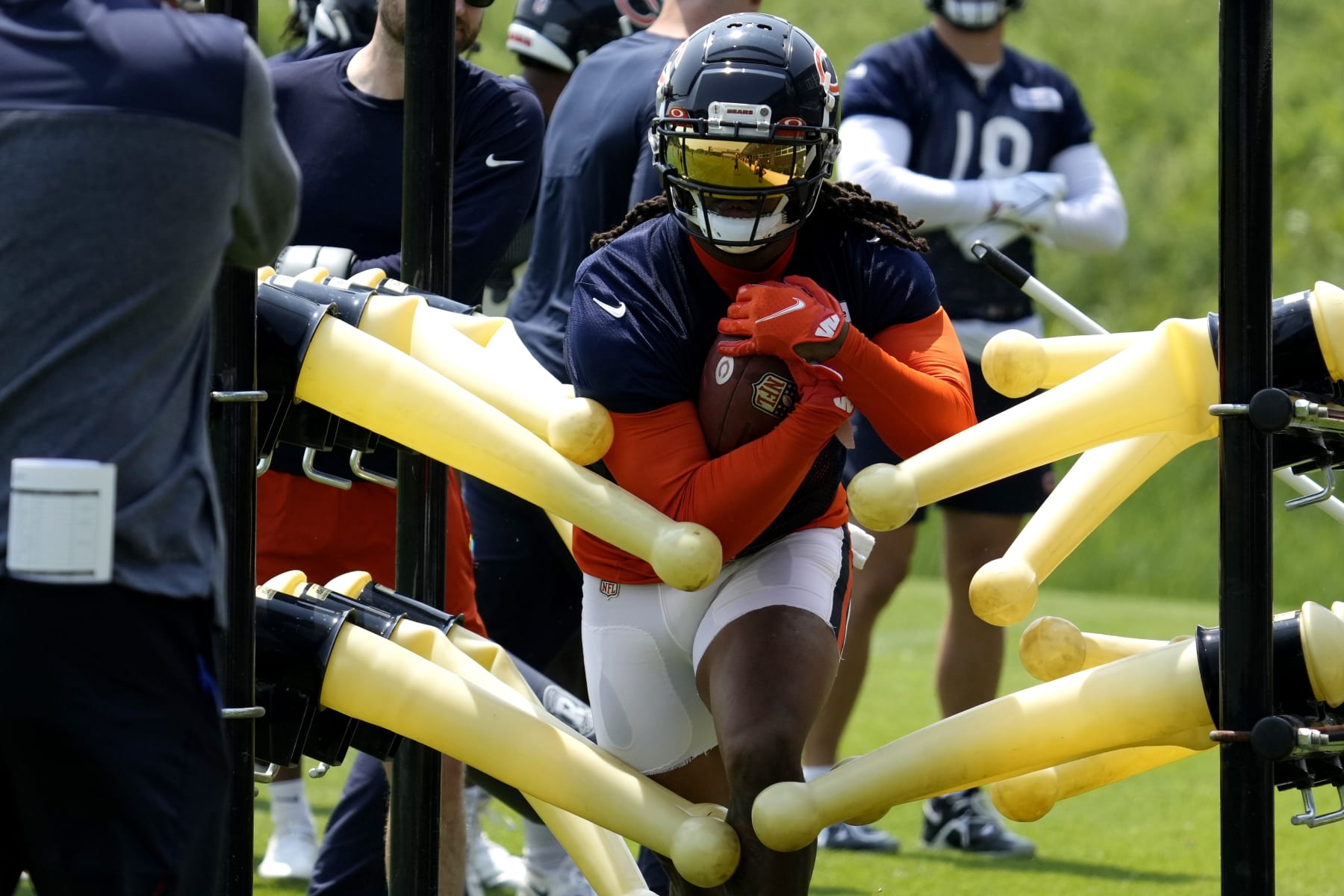Chicago Bears running back D'Onta Foreman works on the field during NFL football OTA practice in Lake Forest, Ill., Wednesday, June 7, 2023. (AP Photo/Nam Y. Huh)