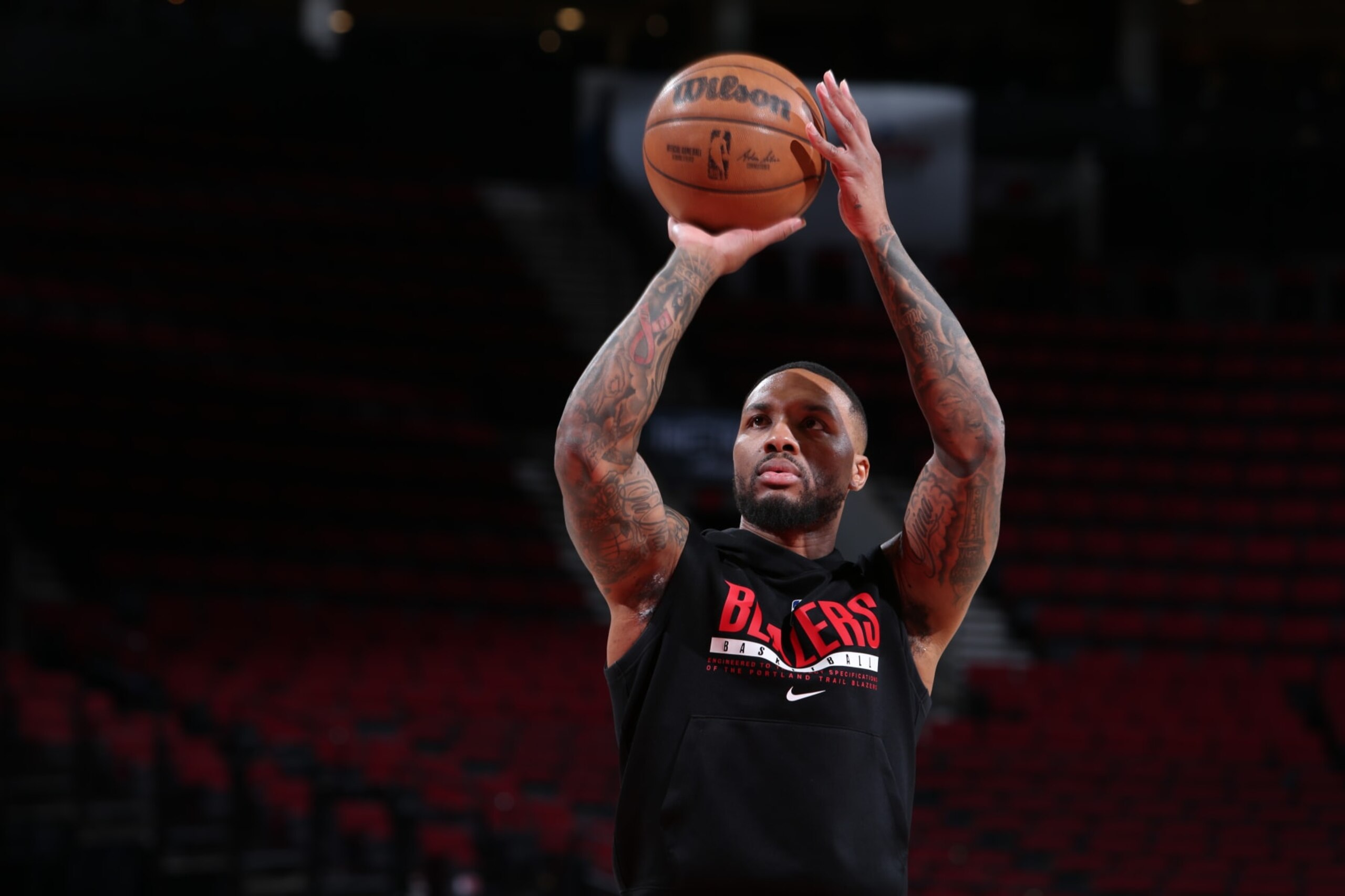 PORTLAND, OR - MARCH 14:  Damian Lillard #0 of the Portland Trail Blazers shoots a free throw before the game on March 14, 2023 at the Moda Center Arena in Portland, Oregon. NOTE TO USER: User expressly acknowledges and agrees that, by downloading and or using this photograph, user is consenting to the terms and conditions of the Getty Images License Agreement. Mandatory Copyright Notice: Copyright 2023 NBAE (Photo by Sam Forencich/NBAE via Getty Images)