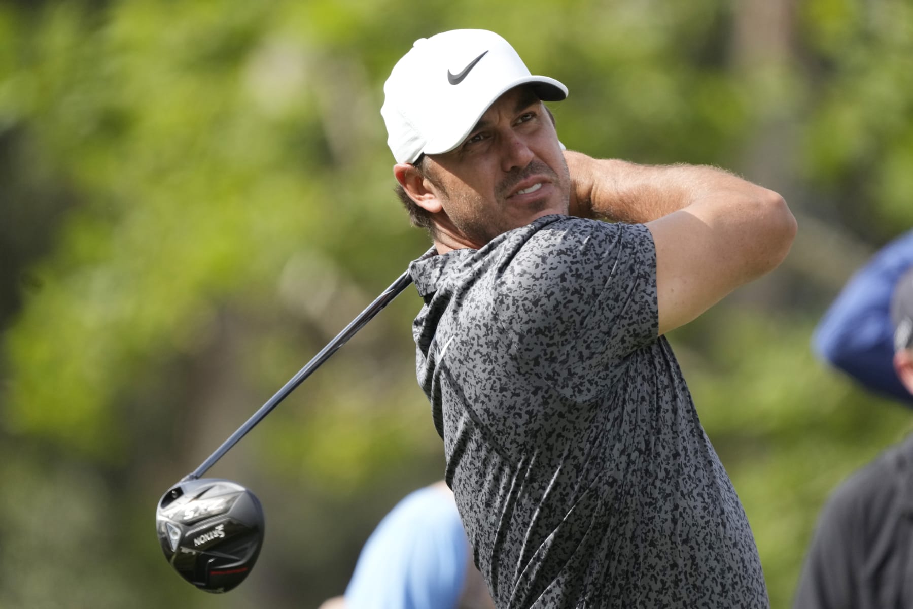 Brooks Koepka hits from the third tee during a practice round of the U.S. Open golf tournament at Los Angeles Country Club, Monday, June 12, 2023, in Los Angeles. (AP Photo/Marcio Jose Sanchez)