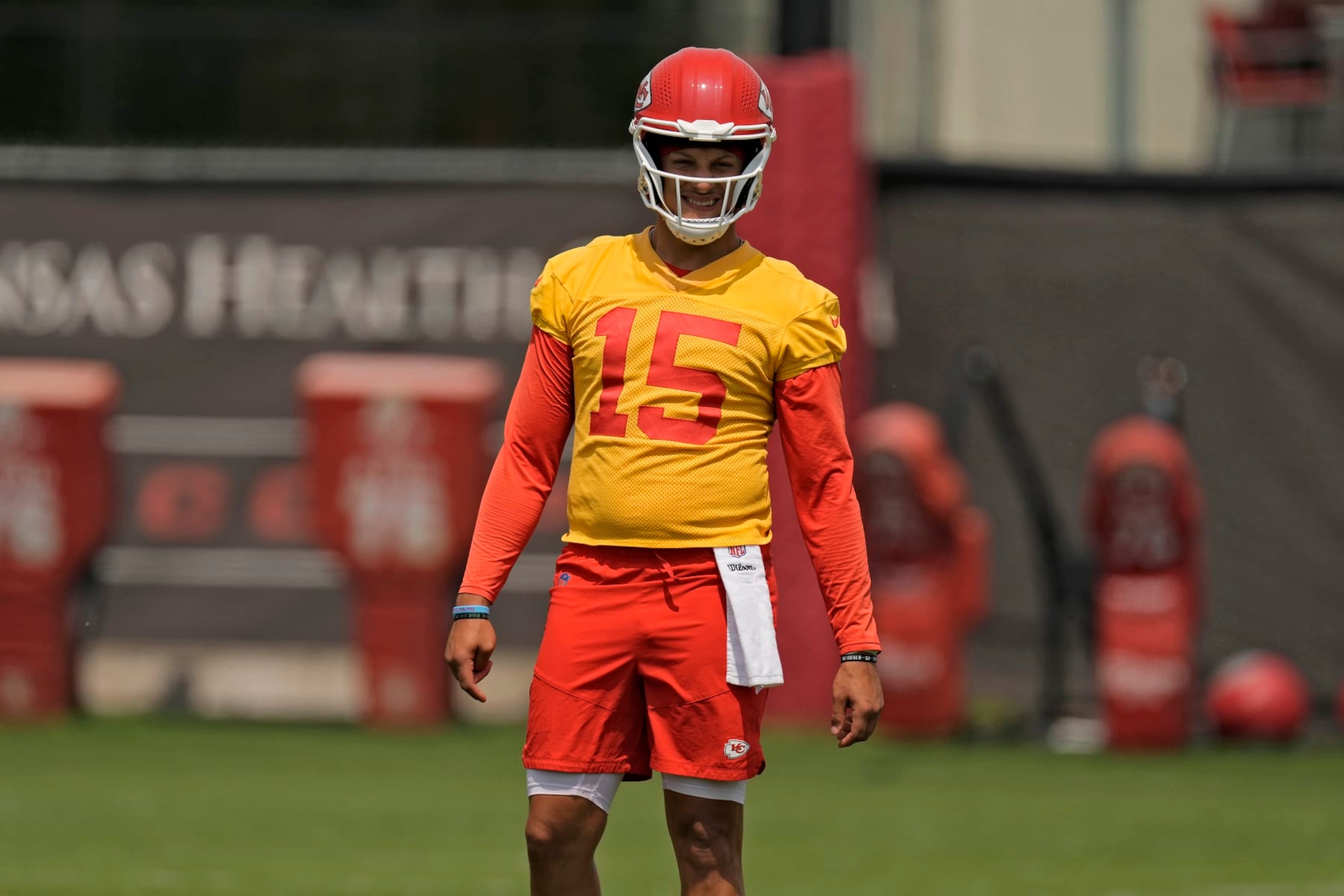 Kansas City Chiefs quarterback Patrick Mahomes (15) watches a drill during the NFL football team's organized team activities Thursday, June 1, 2023, in Kansas City, Mo. (AP Photo/Charlie Riedel)