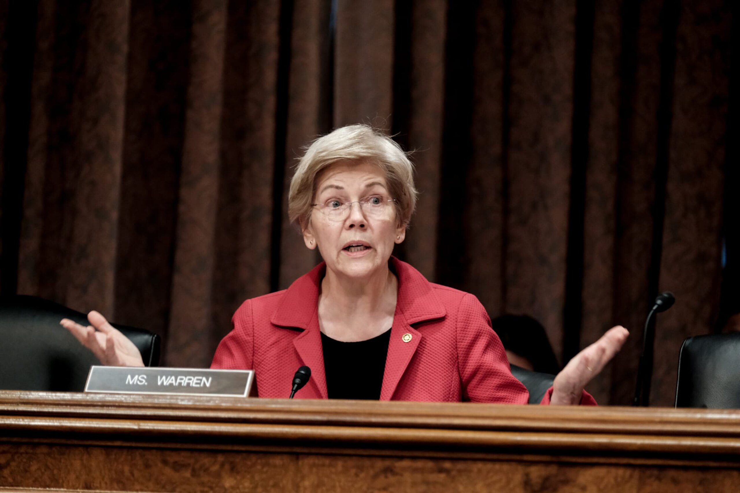 WASHINGTON, DC - JUNE 13: Sen. Elizabeth Warren (D-MA) speaks during a Senate Banking Committee hearing on Capitol Hill on June 13, 2023 in Washington, DC. The committee held the hearing to review "The Consumer Financial Protection Bureau's Semi-Annual Report to Congress." (Photo by Michael A. McCoy/Getty Images) WASHINGTON, DC - JUNE 13: Sen. Elizabeth Warren (D-MA) speaks during a Senate Banking Committee hearing on Capitol Hill on June 13, 2023 in Washington, DC. The committee held the hearing to review "The Consumer Financial Protection Bureau's Semi-Annual Report to Congress." (Photo by Michael A. McCoy/Getty Images)