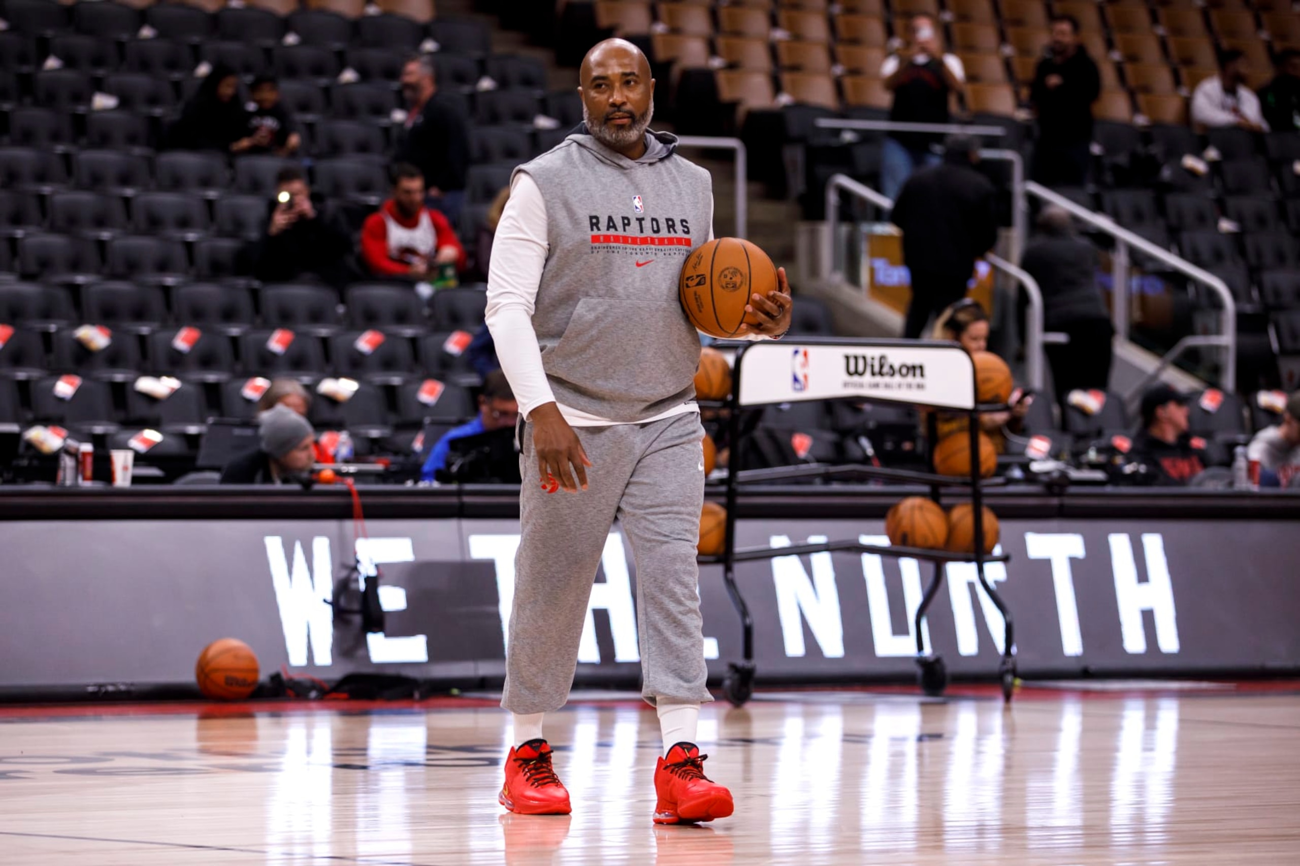 TORONTO, ON - OCTOBER 31: Rico Hines assistant coach of player development for the Toronto Raptors works with players during warmup ahead of their NBA game against the Atlanta Hawks at Scotiabank Arena on October 31, 2022 in Toronto, Canada. NOTE TO USER: User expressly acknowledges and agrees that, by downloading and or using this photograph, User is consenting to the terms and conditions of the Getty Images License Agreement. (Photo by Cole Burston/Getty Images