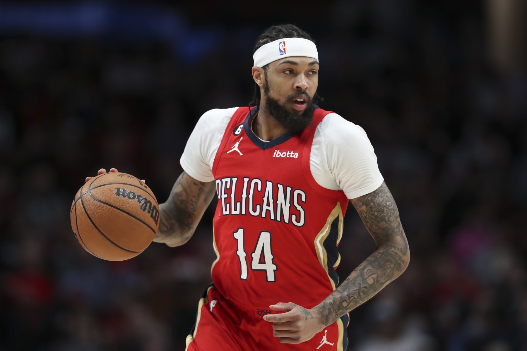 PORTLAND, OREGON - MARCH 27: Brandon Ingram #14 of the New Orleans Pelicans brings the ball up the court during the first quarter against the Portland Trail Blazers at Moda Center on March 27, 2023 in Portland, Oregon. NOTE TO USER: User expressly acknowledges and agrees that, by downloading and or using this photograph, user is consenting to the terms and conditions of the Getty Images License Agreement. (Photo by Amanda Loman/Getty Images)