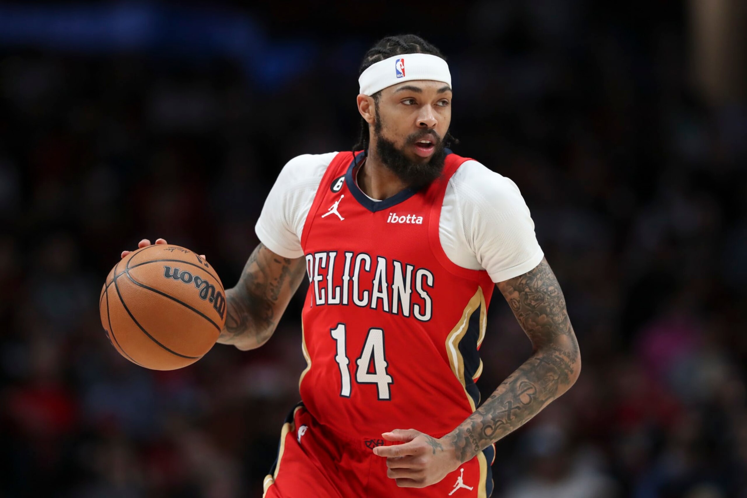 PORTLAND, OREGON - MARCH 27: Brandon Ingram #14 of the New Orleans Pelicans brings the ball up the court during the first quarter against the Portland Trail Blazers at Moda Center on March 27, 2023 in Portland, Oregon. NOTE TO USER: User expressly acknowledges and agrees that, by downloading and or using this photograph, user is consenting to the terms and conditions of the Getty Images License Agreement. (Photo by Amanda Loman/Getty Images) PORTLAND, OREGON - MARCH 27: Brandon Ingram #14 of the New Orleans Pelicans brings the ball up the court during the first quarter against the Portland Trail Blazers at Moda Center on March 27, 2023 in Portland, Oregon. NOTE TO USER: User expressly acknowledges and agrees that, by downloading and or using this photograph, user is consenting to the terms and conditions of the Getty Images License Agreement. (Photo by Amanda Loman/Getty Images)