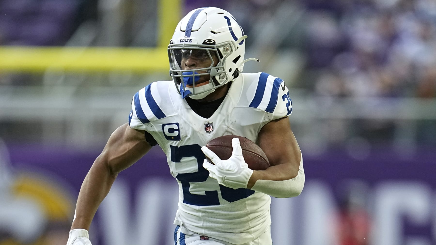 Indianapolis Colts running back Jonathan Taylor runs up field during the first half of an NFL football game against the Minnesota Vikings, Saturday, Dec. 17, 2022, in Minneapolis. (AP Photo/Abbie Parr)