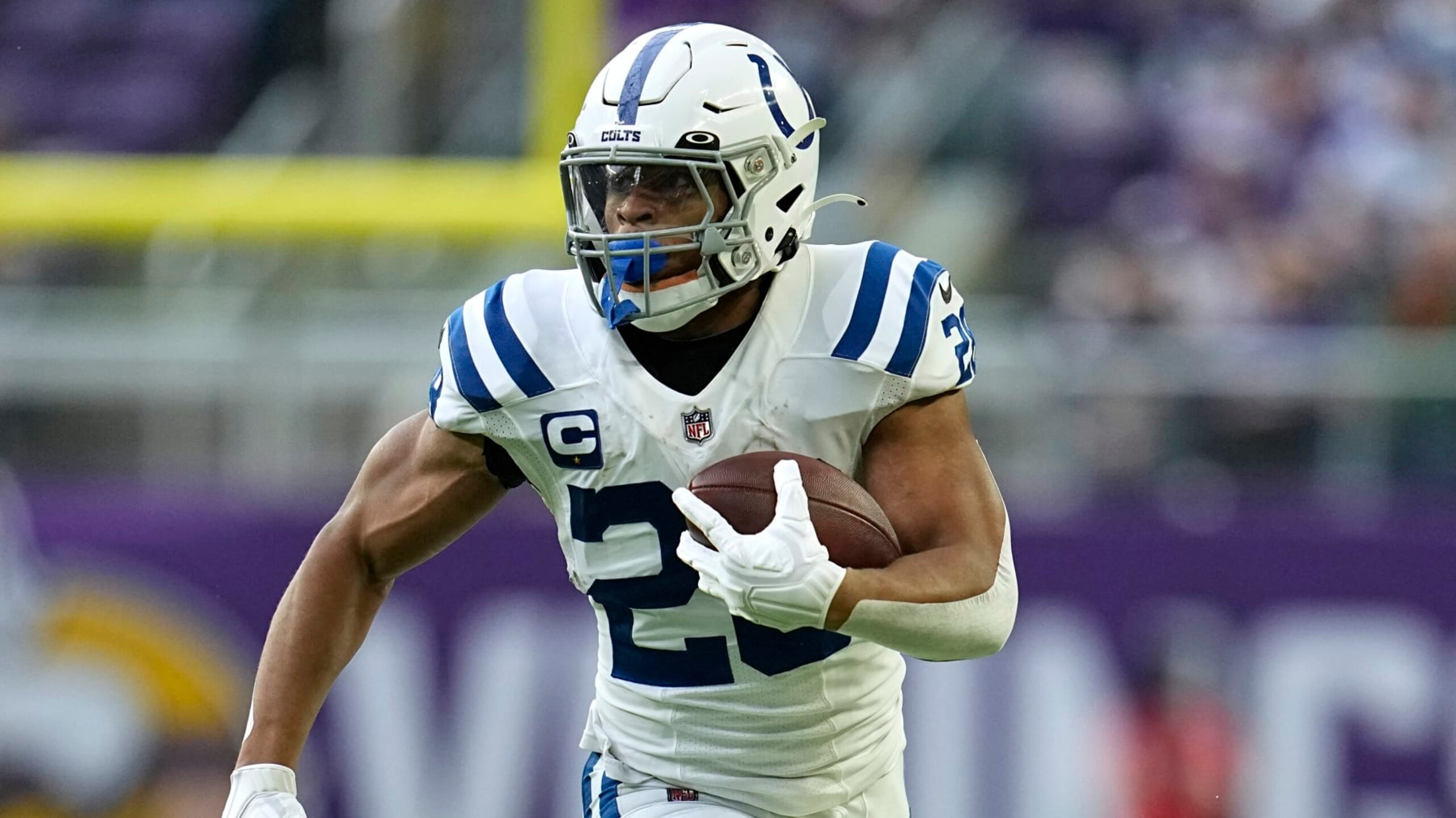 Indianapolis Colts running back Jonathan Taylor runs up field during the first half of an NFL football game against the Minnesota Vikings, Saturday, Dec. 17, 2022, in Minneapolis. (AP Photo/Abbie Parr)