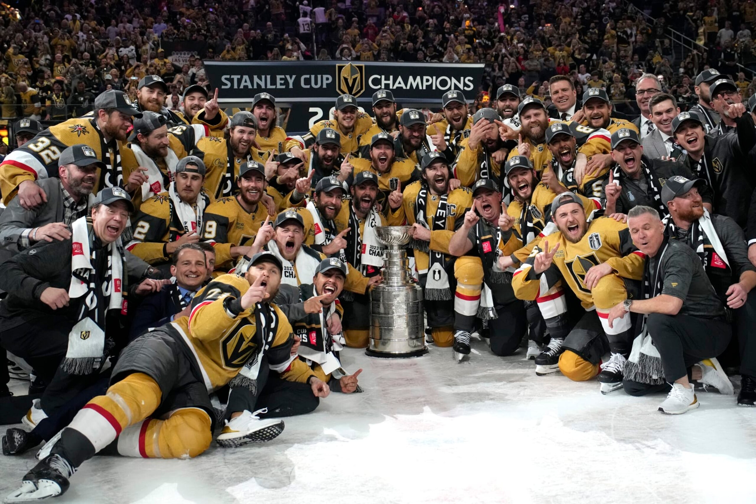 Members of the Vegas Golden Knights pose with the Stanley Cup after the Knights defeated the Florida Panthers 9-3 in Game 5 of the NHL hockey Stanley Cup Finals Tuesday, June 13, 2023, in Las Vegas. The Knights won the series 4-1. (AP Photo/John Locher) Members of the Vegas Golden Knights pose with the Stanley Cup after the Knights defeated the Florida Panthers 9-3 in Game 5 of the NHL hockey Stanley Cup Finals Tuesday, June 13, 2023, in Las Vegas. The Knights won the series 4-1. (AP Photo/John Locher)
