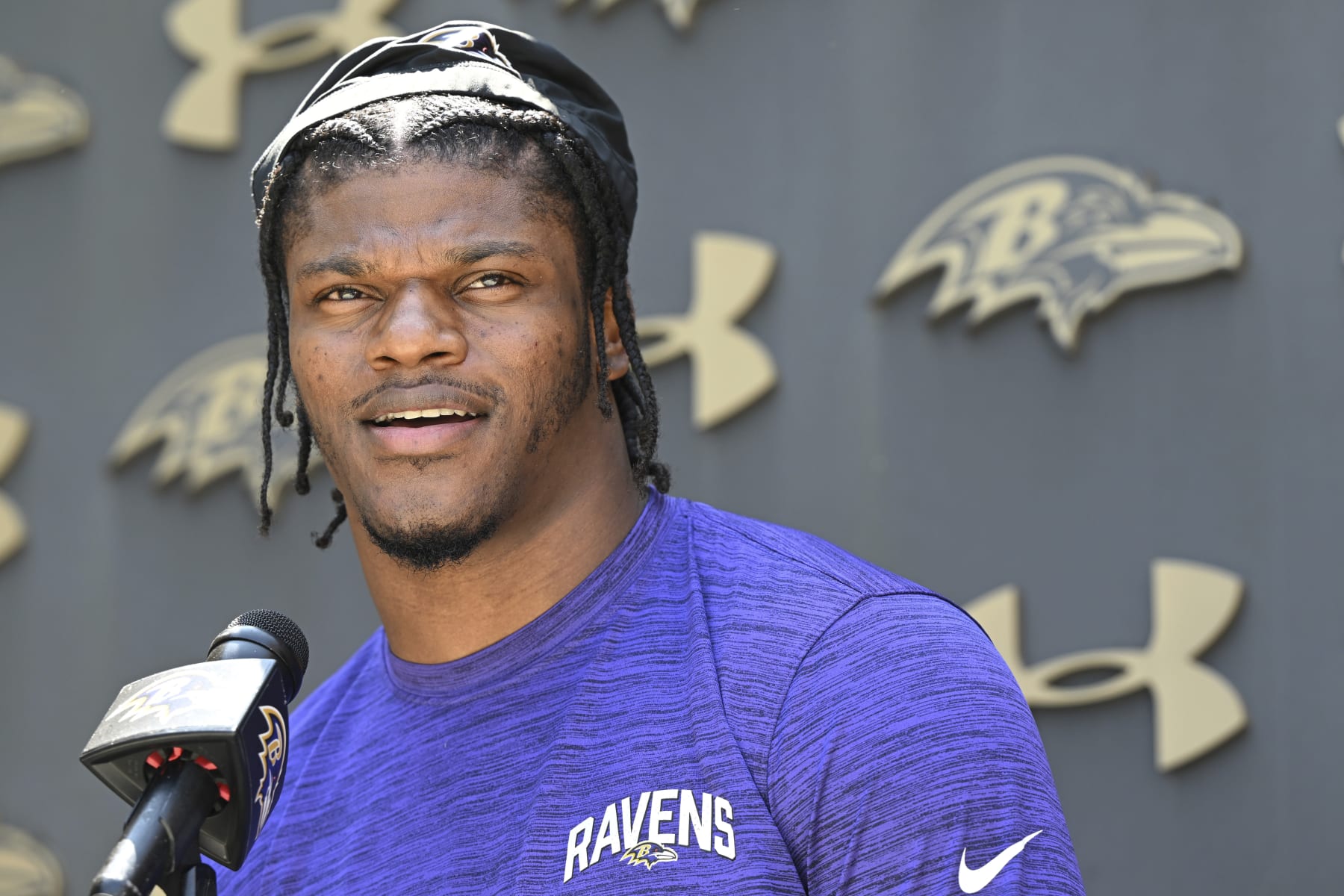 Baltimore Ravens quarterback Lamar Jackson answers questions from the media before a mandatory NFL football mini camp Wednesday, June 14, 2023, in Owings Mills, Md. (AP Photo/Gail Burton)