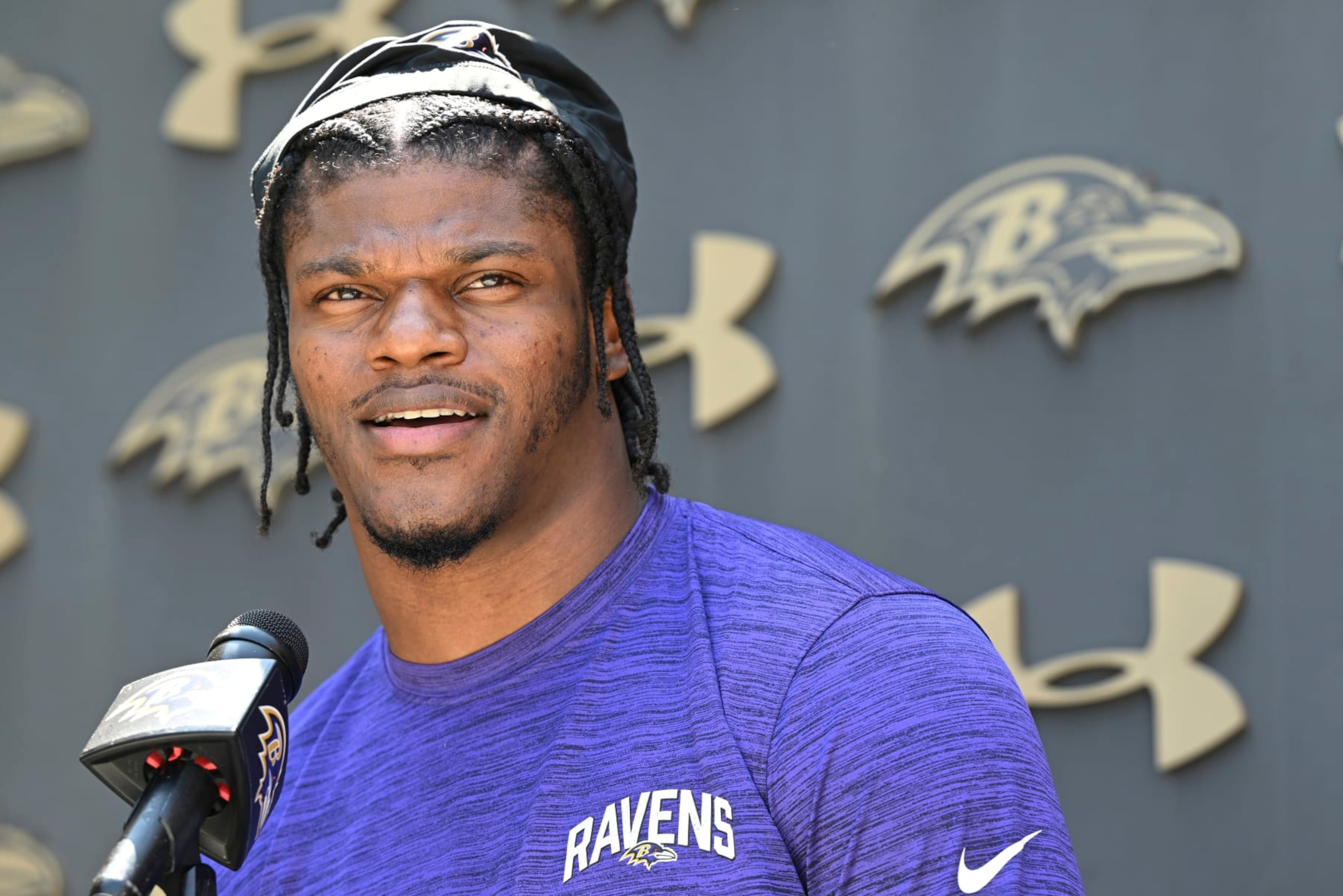 Baltimore Ravens quarterback Lamar Jackson answers questions from the media before a mandatory NFL football mini camp Wednesday, June 14, 2023, in Owings Mills, Md. (AP Photo/Gail Burton)