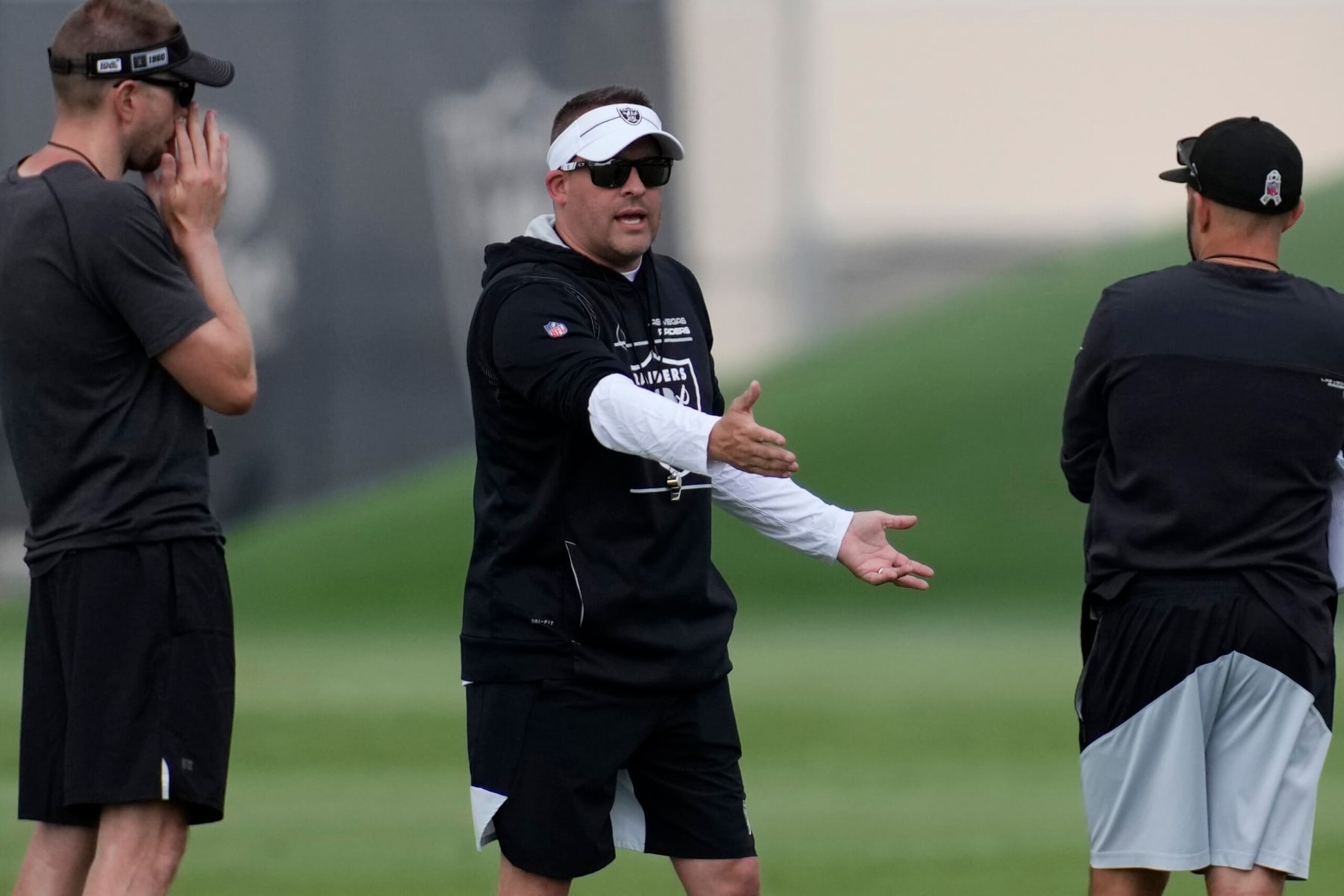 Las Vegas Raiders head coach Josh McDaniels motions during an NFL football practice at the team's training facility Wednesday, June 7, 2023, in Henderson, Nev. (AP Photo/John Locher) Las Vegas Raiders head coach Josh McDaniels motions during an NFL football practice at the team's training facility Wednesday, June 7, 2023, in Henderson, Nev. (AP Photo/John Locher)