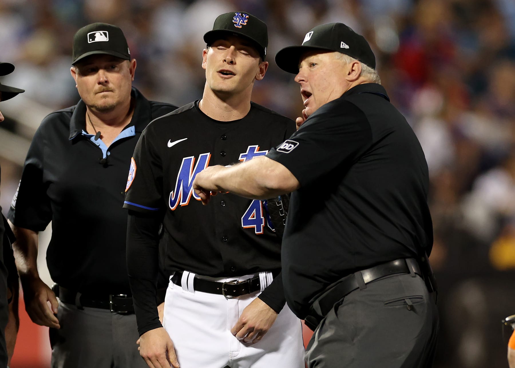NEW YORK, NEW YORK - JUNE 13:  Umpire Bill Miller throws out New York Mets pitcher Drew Smith #40 for a suspicious substance on his hands before the start of the seventh inning against the New York Yankees at Citi Field on June 13, 2023 in the Flushing neighborhood of the Queens borough of New York City. (Photo by Elsa/Getty Images)