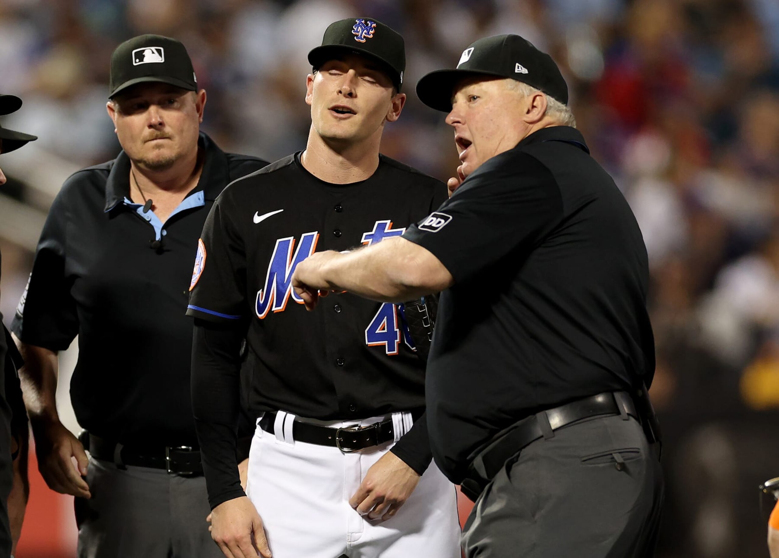 NEW YORK, NEW YORK - JUNE 13:  Umpire Bill Miller throws out New York Mets pitcher Drew Smith #40 for a suspicious substance on his hands before the start of the seventh inning against the New York Yankees at Citi Field on June 13, 2023 in the Flushing neighborhood of the Queens borough of New York City. (Photo by Elsa/Getty Images)