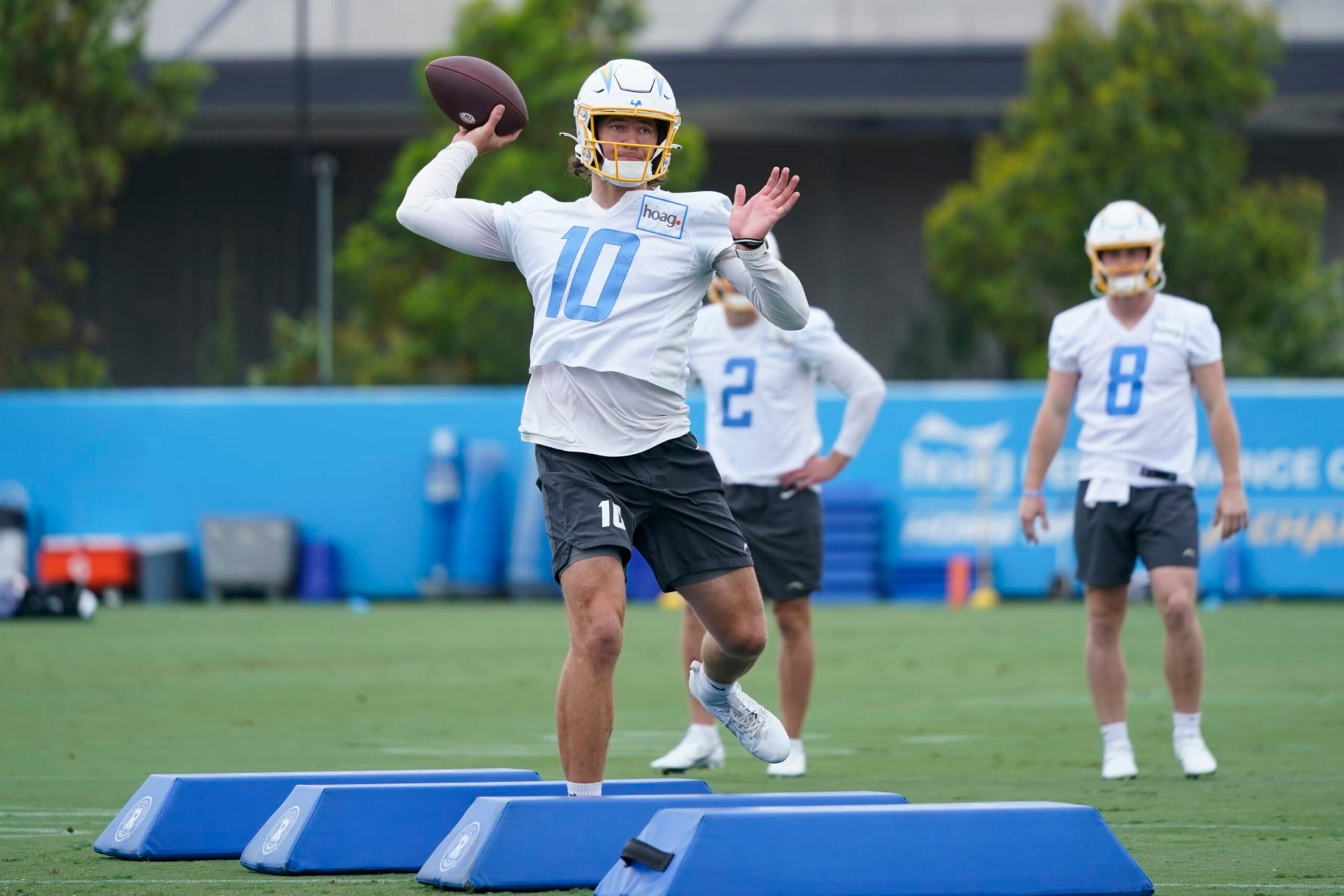 Los Angeles Chargers quarterback Justin Herbert (10) runs a drill during the NFL football team's camp in Costa Mesa, Calif., Wednesday, June 14, 2023. (AP Photo/Jae C. Hong)