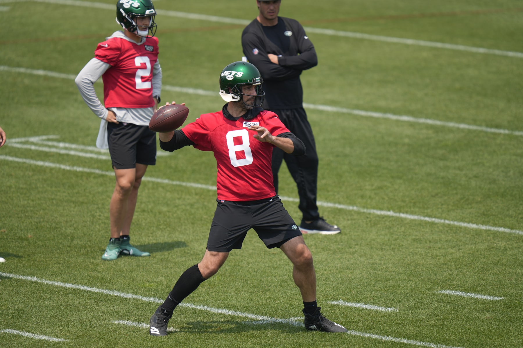 New York Jets quarterback Aaron Rodgers (8) throws during a drill at the NFL football team's training facility in Florham Park, N.J., Tuesday, June 6, 2023. (AP Photo/Seth Wenig)