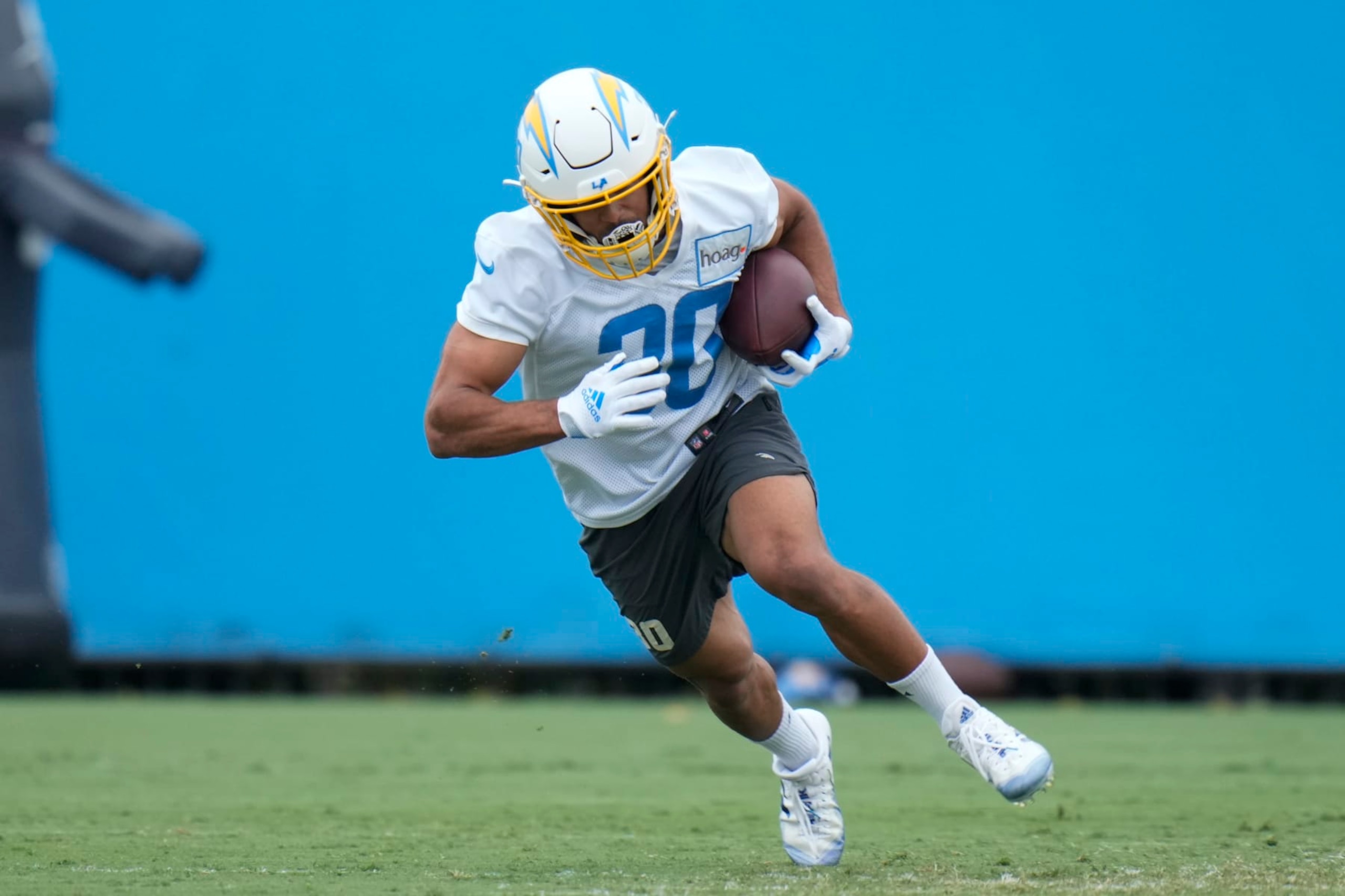 Los Angeles Chargers running back Austin Ekeler (30) runs a drill during the NFL football team's camp in Costa Mesa, Calif., Wednesday, June 14, 2023. (AP Photo/Jae C. Hong)