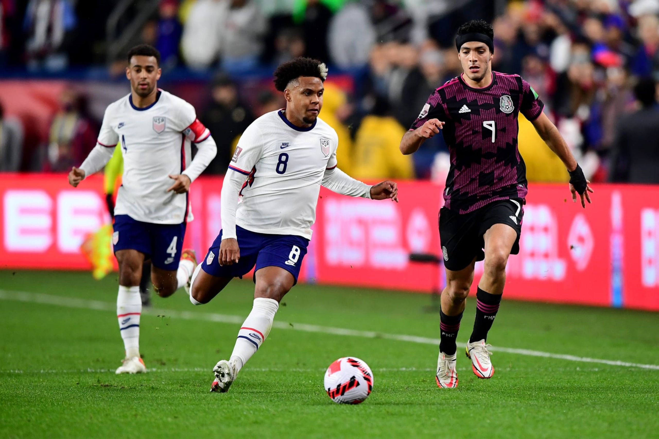 CINCINNATI, OHIO - NOVEMBER 12: Weston McKennie #8 of the United States controls the ball against Raul Jimenez #9 of Mexico during a FIFA World Cup 2022 qualifying match between the United States and Mexico at TQL Stadium on November 12, 2021 in Cincinnati, Ohio. (Photo by Emilee Chinn/Getty Images)