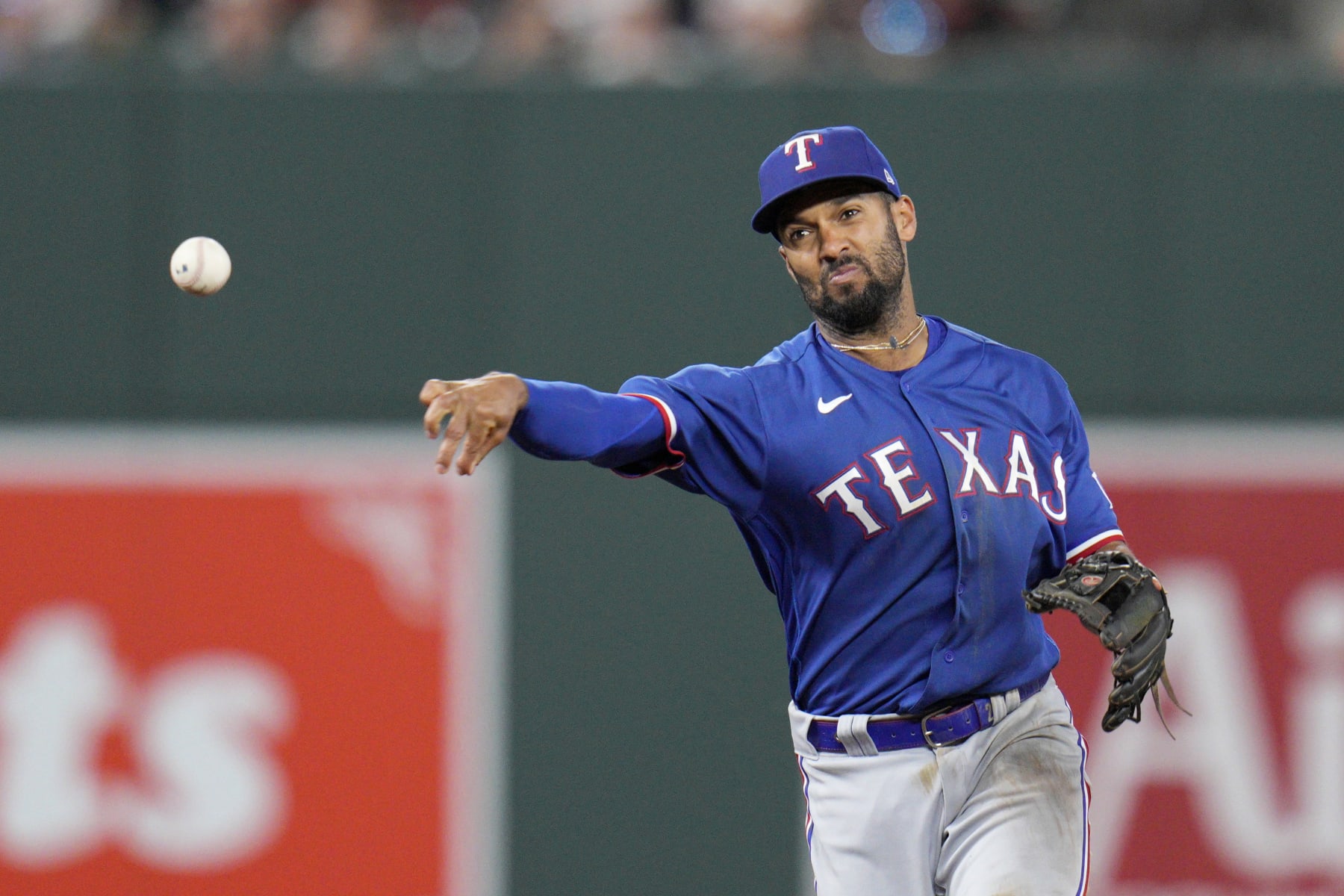 BALTIMORE, MARYLAND - MAY 26: Marcus Semien #2 of the Texas Rangers throws out Austin Hays #21 of the Baltimore Orioles during the ninth inning at Oriole Park at Camden Yards on May 26, 2023 in Baltimore, Maryland. (Photo by Jess Rapfogel/Getty Images)