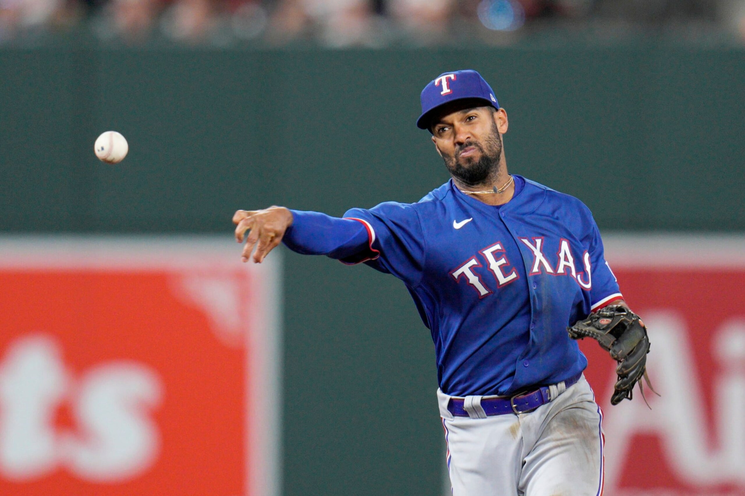 BALTIMORE, MARYLAND - MAY 26: Marcus Semien #2 of the Texas Rangers throws out Austin Hays #21 of the Baltimore Orioles during the ninth inning at Oriole Park at Camden Yards on May 26, 2023 in Baltimore, Maryland. (Photo by Jess Rapfogel/Getty Images)