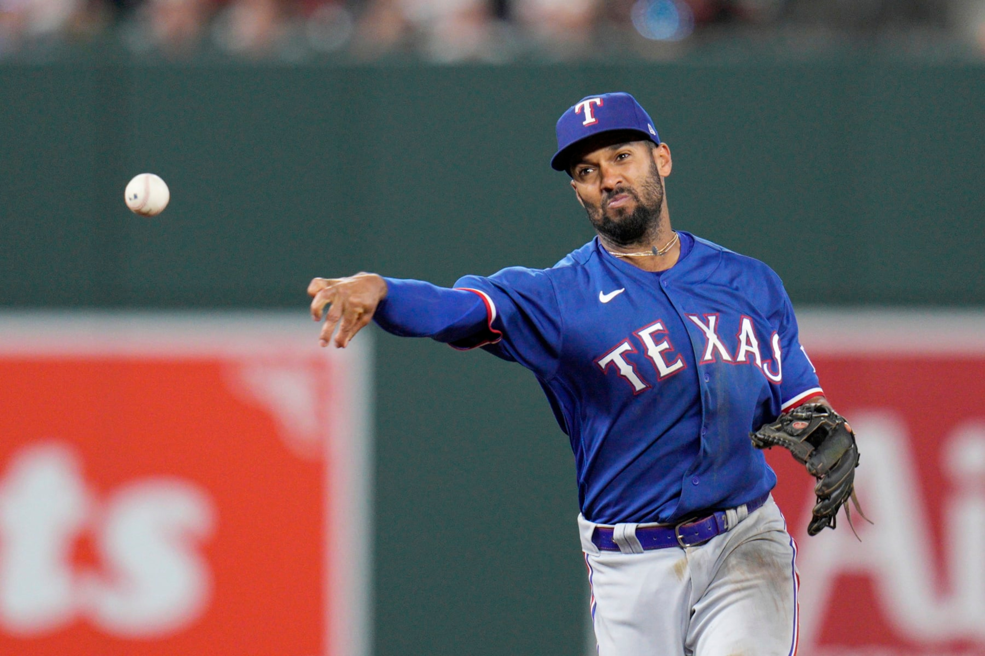 BALTIMORE, MARYLAND - MAY 26: Marcus Semien #2 of the Texas Rangers throws out Austin Hays #21 of the Baltimore Orioles during the ninth inning at Oriole Park at Camden Yards on May 26, 2023 in Baltimore, Maryland. (Photo by Jess Rapfogel/Getty Images)