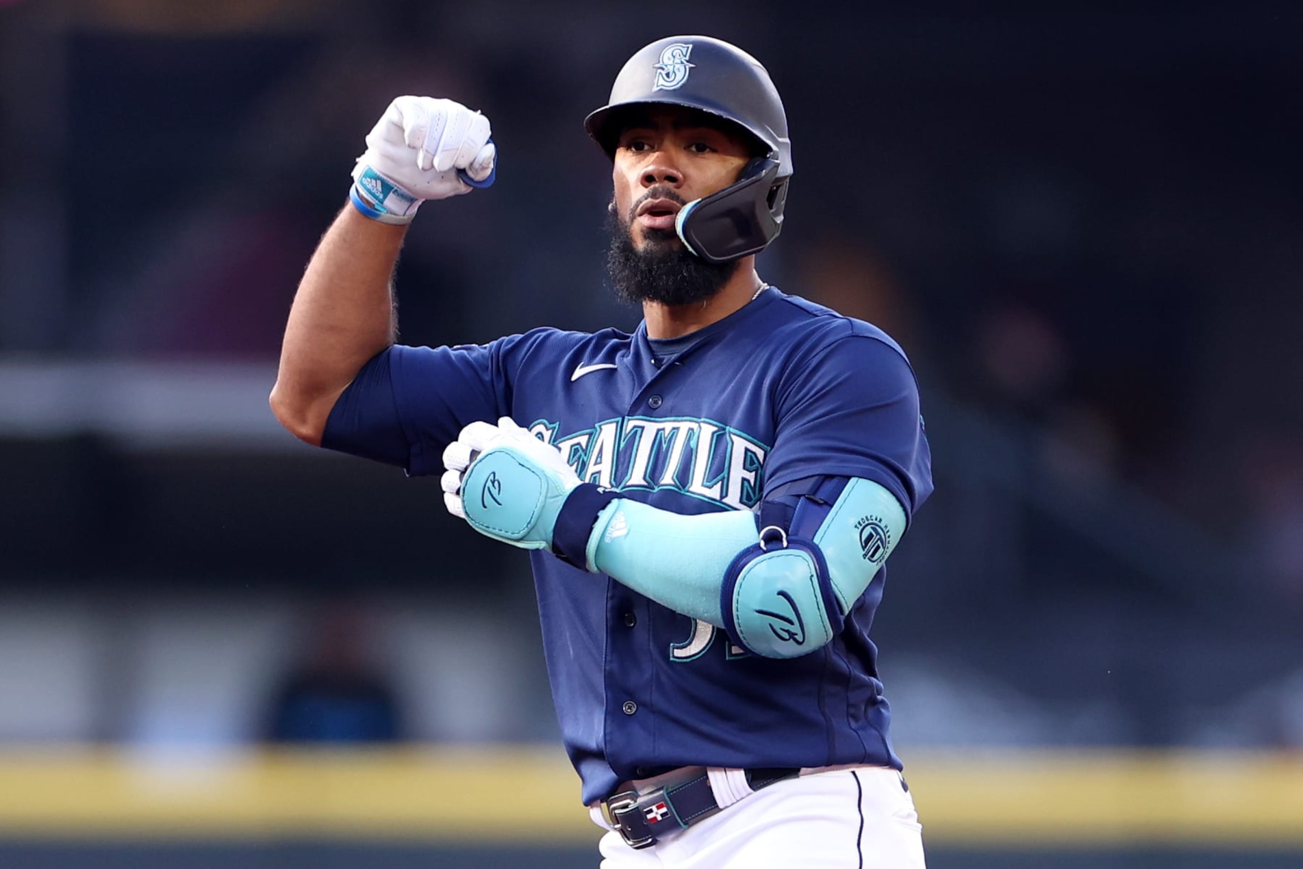 SEATTLE, WASHINGTON - JUNE 12: Teoscar Hernandez #35 of the Seattle Mariners reacts after his double against the Miami Marlins during the first inning at T-Mobile Park on June 12, 2023 in Seattle, Washington. (Photo by Steph Chambers/Getty Images)