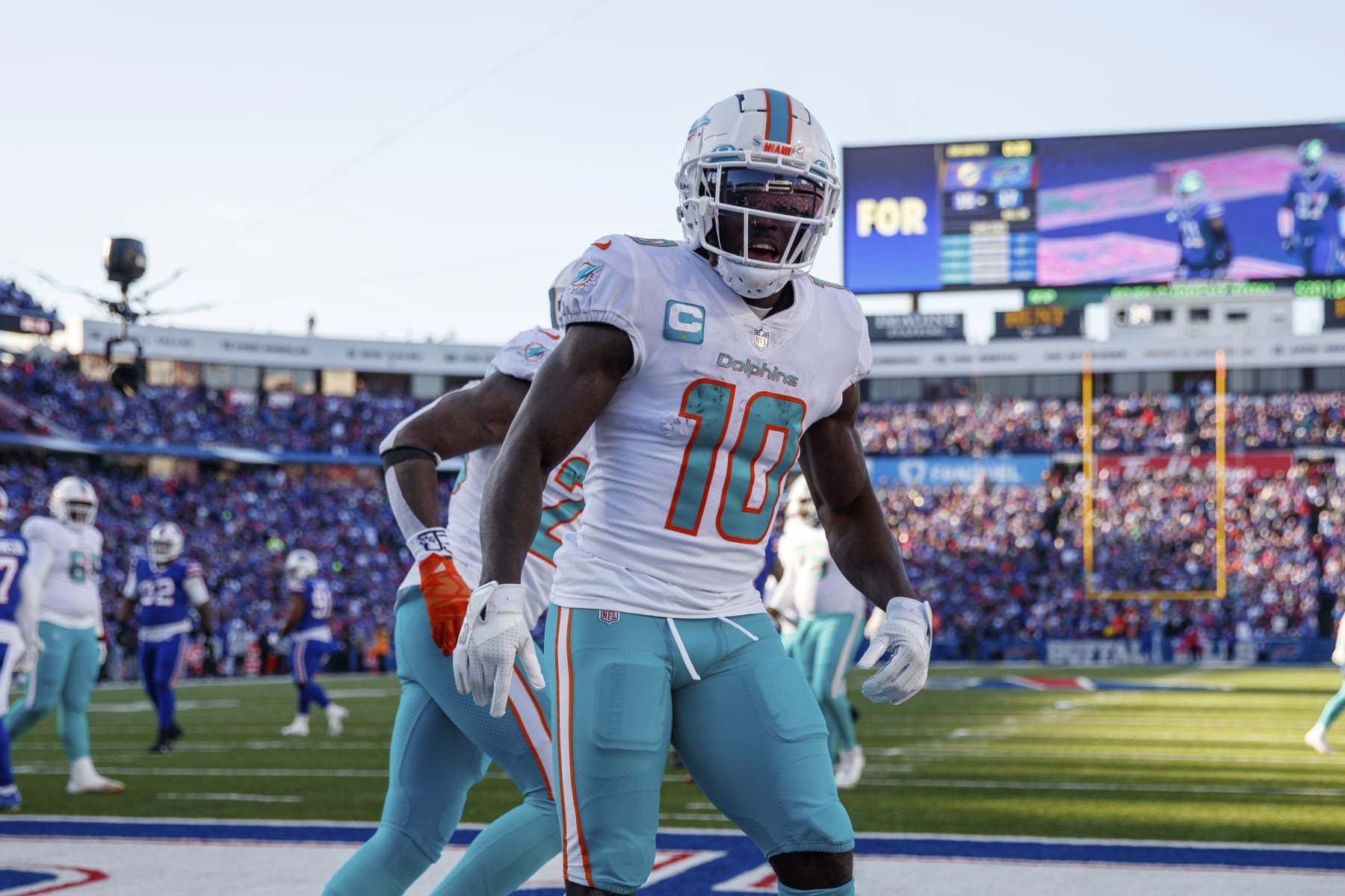 Miami Dolphins wide receiver Tyreek Hill (10) celebrates after catching a two-point conversion during an NFL wild-card football game Sunday, Jan. 15, 2023, in Orchard Park, NY. (AP Photo/Matt Durisko)