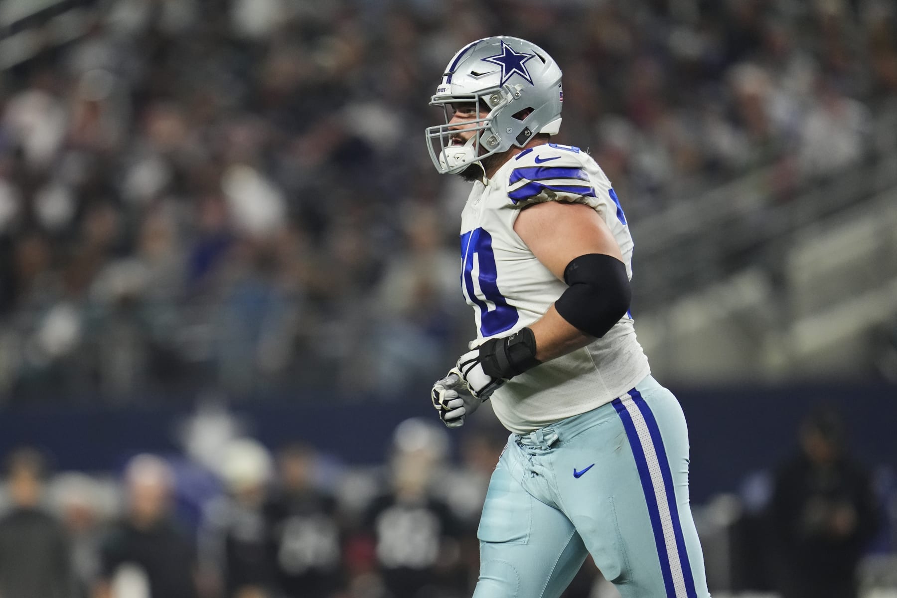 ARLINGTON, TX - DECEMBER 24: Zack Martin #70 of the Dallas Cowboys gets set against the Philadelphia Eagles at AT&T Stadium on December 24, 2022 in Arlington, Texas. (Photo by Cooper Neill/Getty Images)