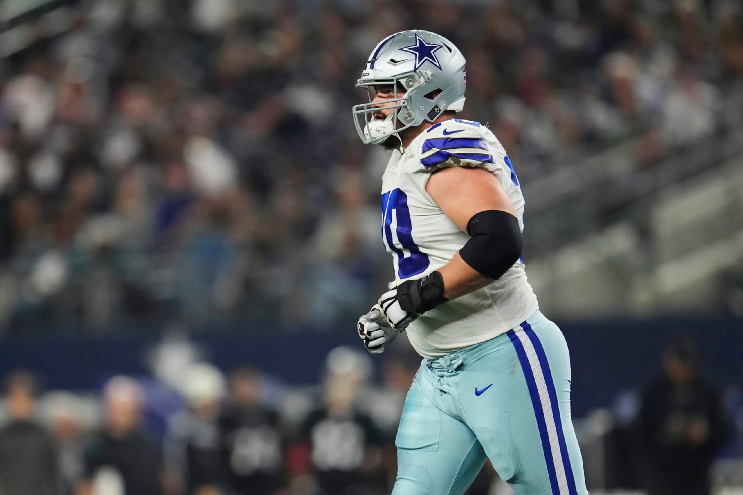 ARLINGTON, TX - DECEMBER 24: Zack Martin #70 of the Dallas Cowboys gets set against the Philadelphia Eagles at AT&T Stadium on December 24, 2022 in Arlington, Texas. (Photo by Cooper Neill/Getty Images)