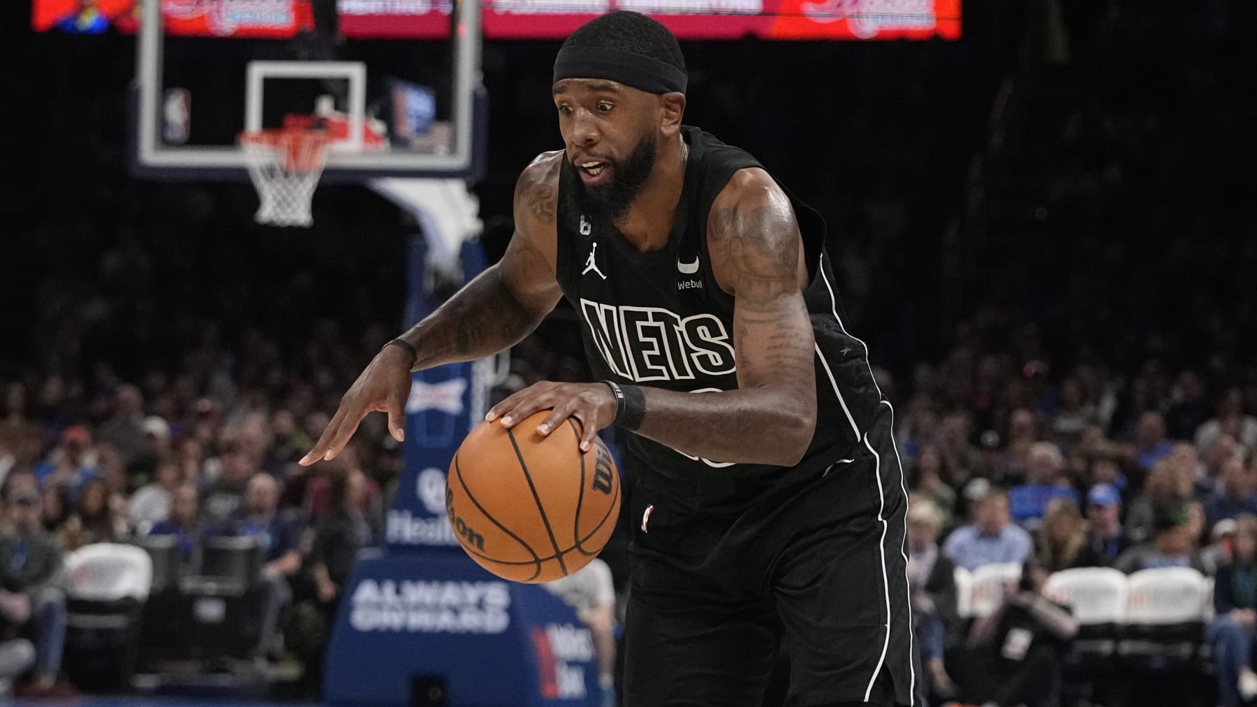 Brooklyn Nets forward Royce O'Neale (00) during an NBA basketball game against the Oklahoma City Thunder, Tuesday, March 14, 2023, in Oklahoma City. (AP Photo/Sue Ogrocki)
