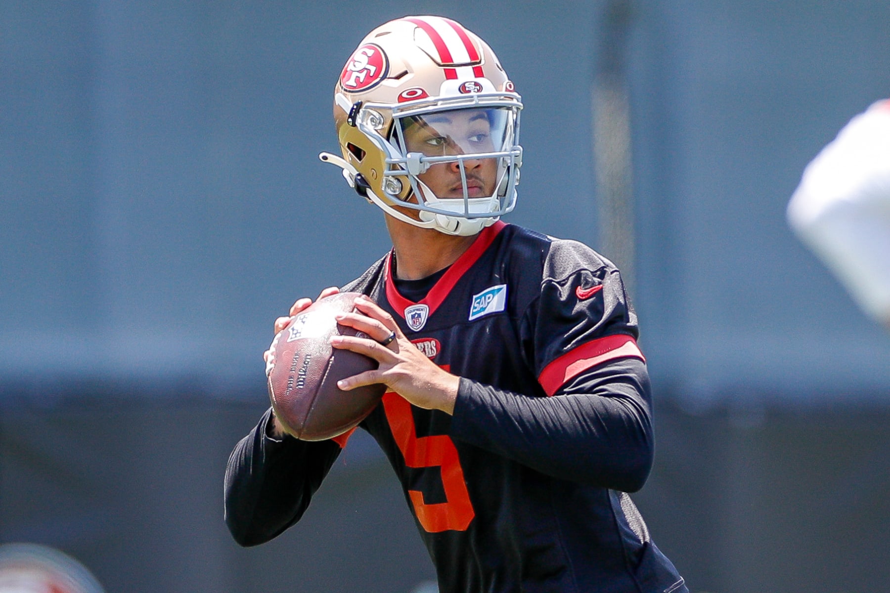 SANTA CLARA, CA - MAY 31: San Francisco 49ers quarterback Trey Lance (5) looks to throw in a drill during the team's OTA practice on May 31, 2023, at the SAP Performance Facility in Santa Clara, CA. (Photo by Brandon Sloter/Icon Sportswire via Getty Images)