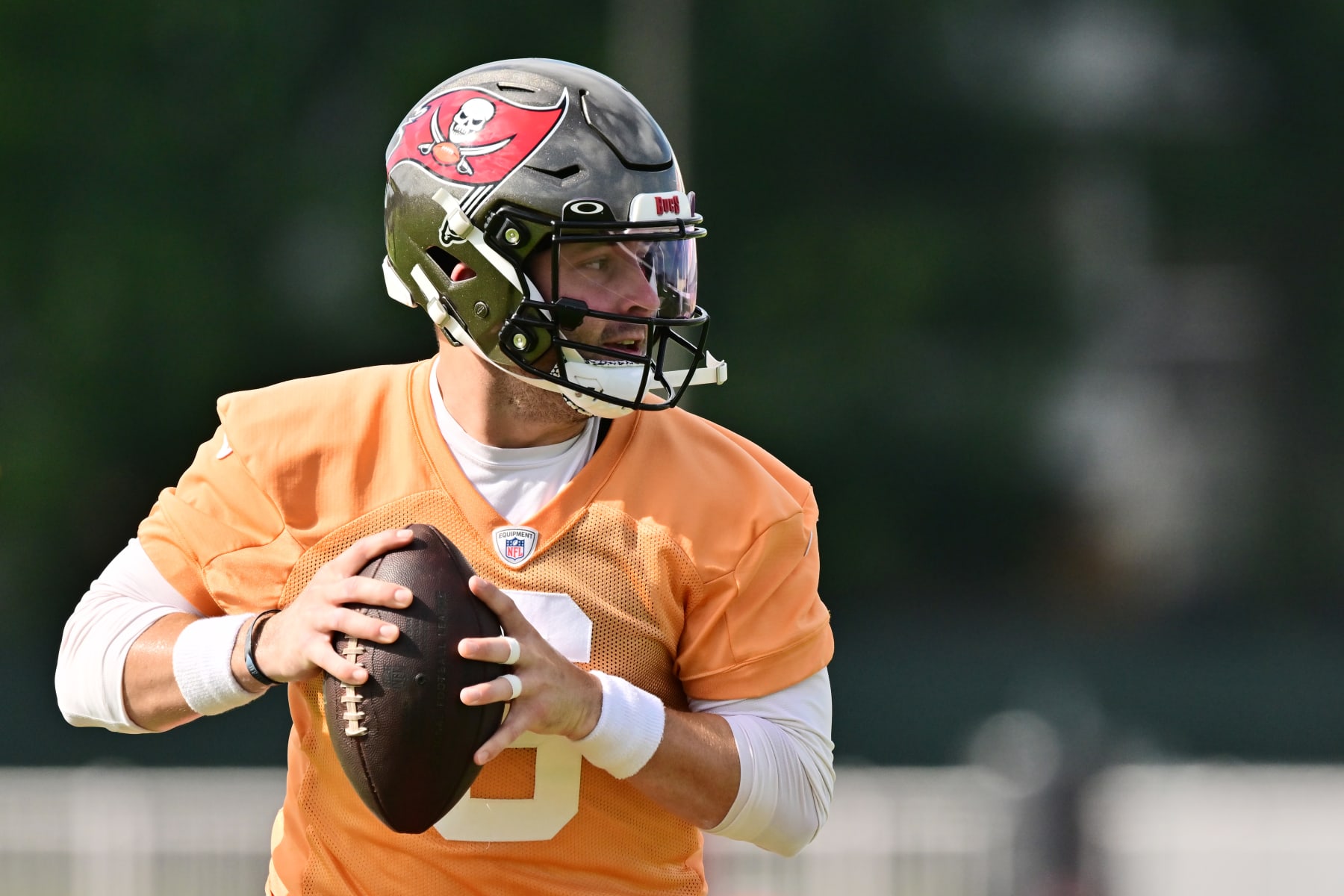 TAMPA, FLORIDA - JUNE 13: Baker Mayfield #6 of the Tampa Bay Buccaneers looks to throw a pass during a mandatory Minicamp at AdventHealth Training Center on June 13, 2023 in Tampa, Florida. (Photo by Julio Aguilar/Getty Images)