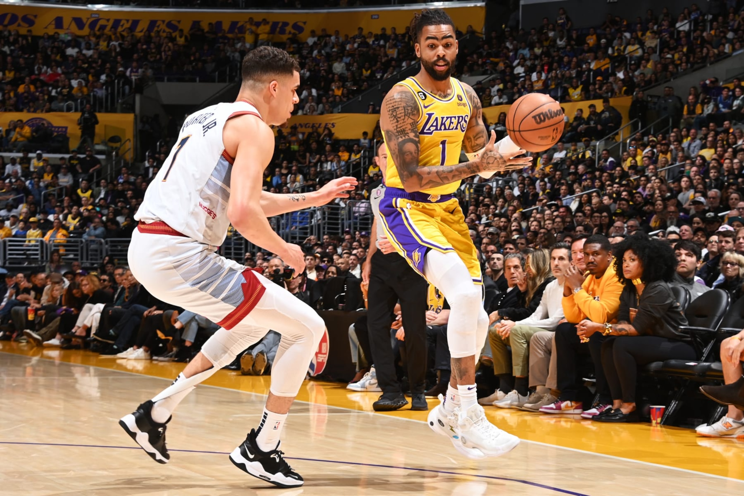 LOS ANGELES, CA - MAY 22: D'Angelo Russell #1 of the Los Angeles Lakers dribbles the ball during Round 3 Game 4 of the Western Conference Finals 2023 NBA Playoffs against the Denver Nuggets on May 22, 2023 at Crypto.Com Arena in Los Angeles, California. NOTE TO USER: User expressly acknowledges and agrees that, by downloading and/or using this Photograph, user is consenting to the terms and conditions of the Getty Images License Agreement. Mandatory Copyright Notice: Copyright 2023 NBAE (Photo by Andrew D. Bernstein/NBAE via Getty Images)