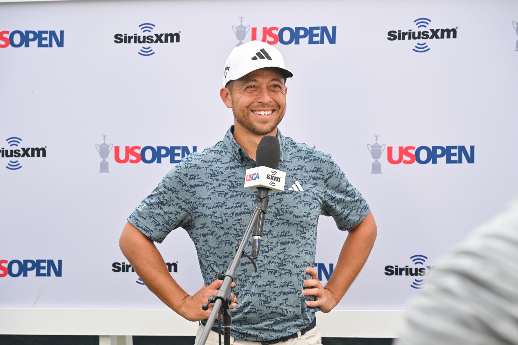 LOS ANGELES, CALIFORNIA - JUNE 15: Xander Schauffele smiles during an interview during the first round of the 123rd U.S. Open Championship at The Los Angeles Country Club (North Course) on June 15, 2023 in Los Angeles, California. (Photo by Ben Jared/PGA TOUR via Getty Images)