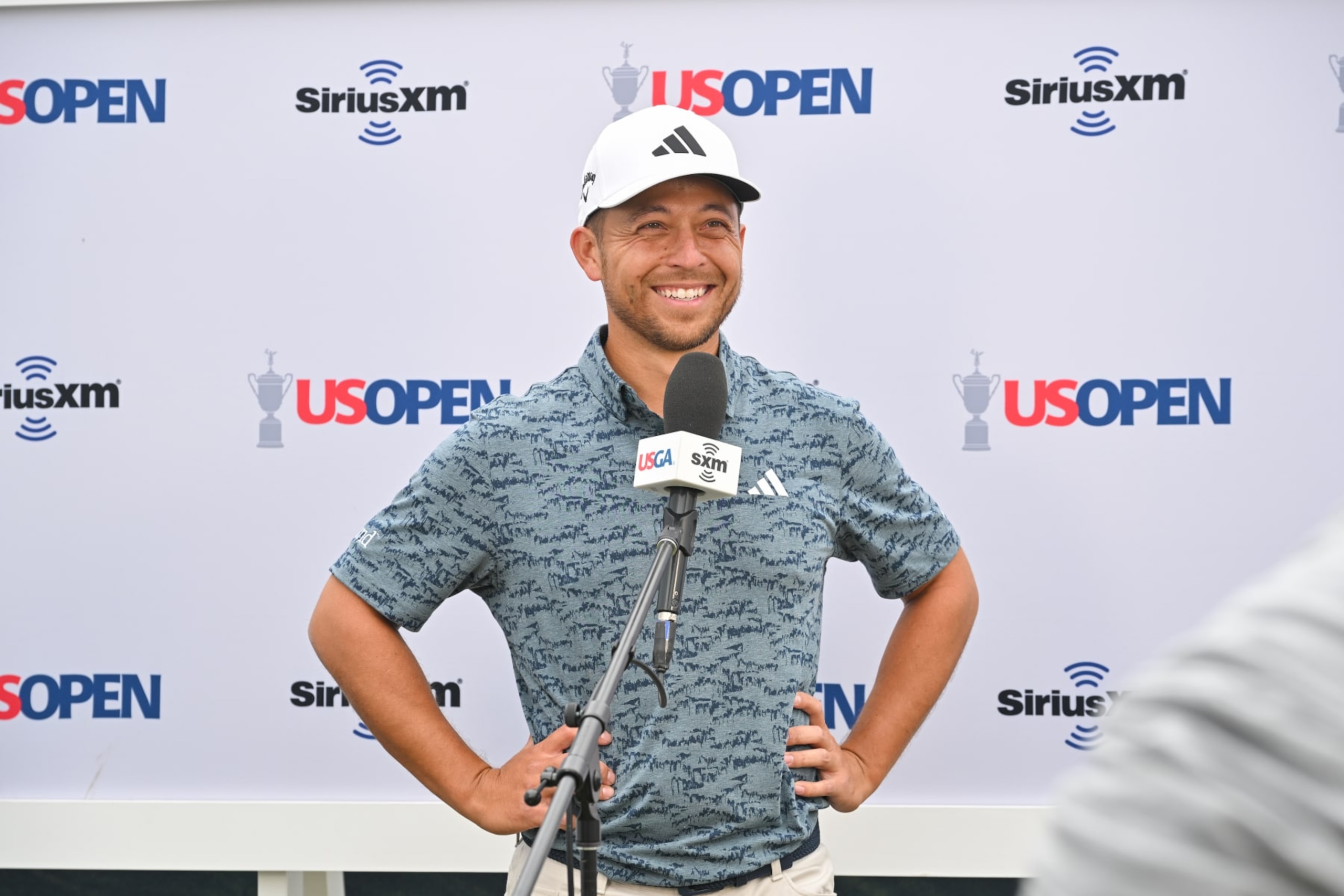 LOS ANGELES, CALIFORNIA - JUNE 15: Xander Schauffele smiles during an interview during the first round of the 123rd U.S. Open Championship at The Los Angeles Country Club (North Course) on June 15, 2023 in Los Angeles, California. (Photo by Ben Jared/PGA TOUR via Getty Images)