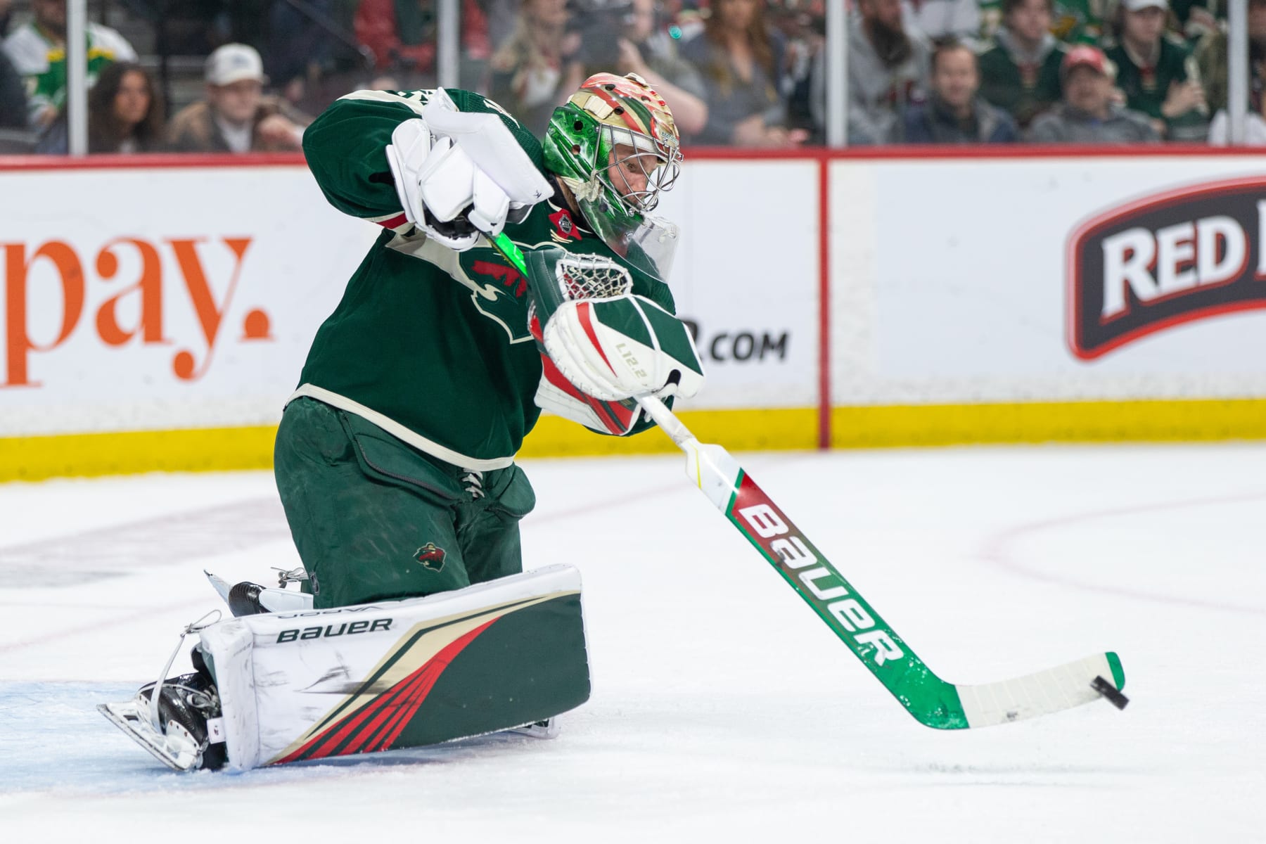 SAINT PAUL, MN - APRIL 28: Minnesota Wild goaltender Filip Gustavsson (32) passes the puck during Game Six of the First Round of the 2023 Stanley Cup Playoffs between the Minnesota Wild and the Dallas Stars, on April 28th, 2023, at the Xcel Energy Center in Saint Paul, MN. (Photo by Bailey Hillesheim/Icon Sportswire via Getty Images)