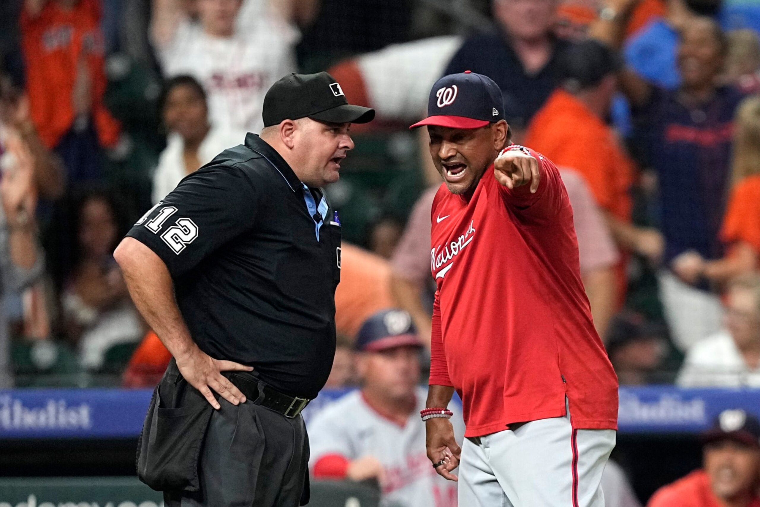 Washington Nationals manager Dave Martinez, right, argues with home plate umpire Jeremy Riggs after the final play during the ninth inning of a baseball game against the Houston Astros Wednesday, June 14, 2023, in Houston. The Astros won 5-4. (AP Photo/David J. Phillip) Washington Nationals manager Dave Martinez, right, argues with home plate umpire Jeremy Riggs after the final play during the ninth inning of a baseball game against the Houston Astros Wednesday, June 14, 2023, in Houston. The Astros won 5-4. (AP Photo/David J. Phillip)