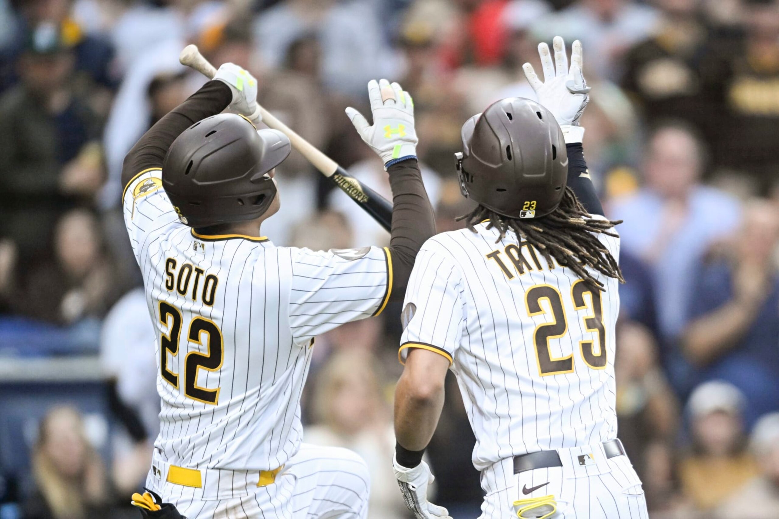 SAN DIEGO, CA - JUNE 13: Fernando Tatis Jr. #23 and Juan Soto #22 of the San Diego Padres celebrate after Tatis's solo home run in the third inning against the Cleveland Guardians June 13, 2023 at Petco Park in San Diego, California. (Photo by Denis Poroy/Getty Images) SAN DIEGO, CA - JUNE 13: Fernando Tatis Jr. #23 and Juan Soto #22 of the San Diego Padres celebrate after Tatis's solo home run in the third inning against the Cleveland Guardians June 13, 2023 at Petco Park in San Diego, California. (Photo by Denis Poroy/Getty Images)