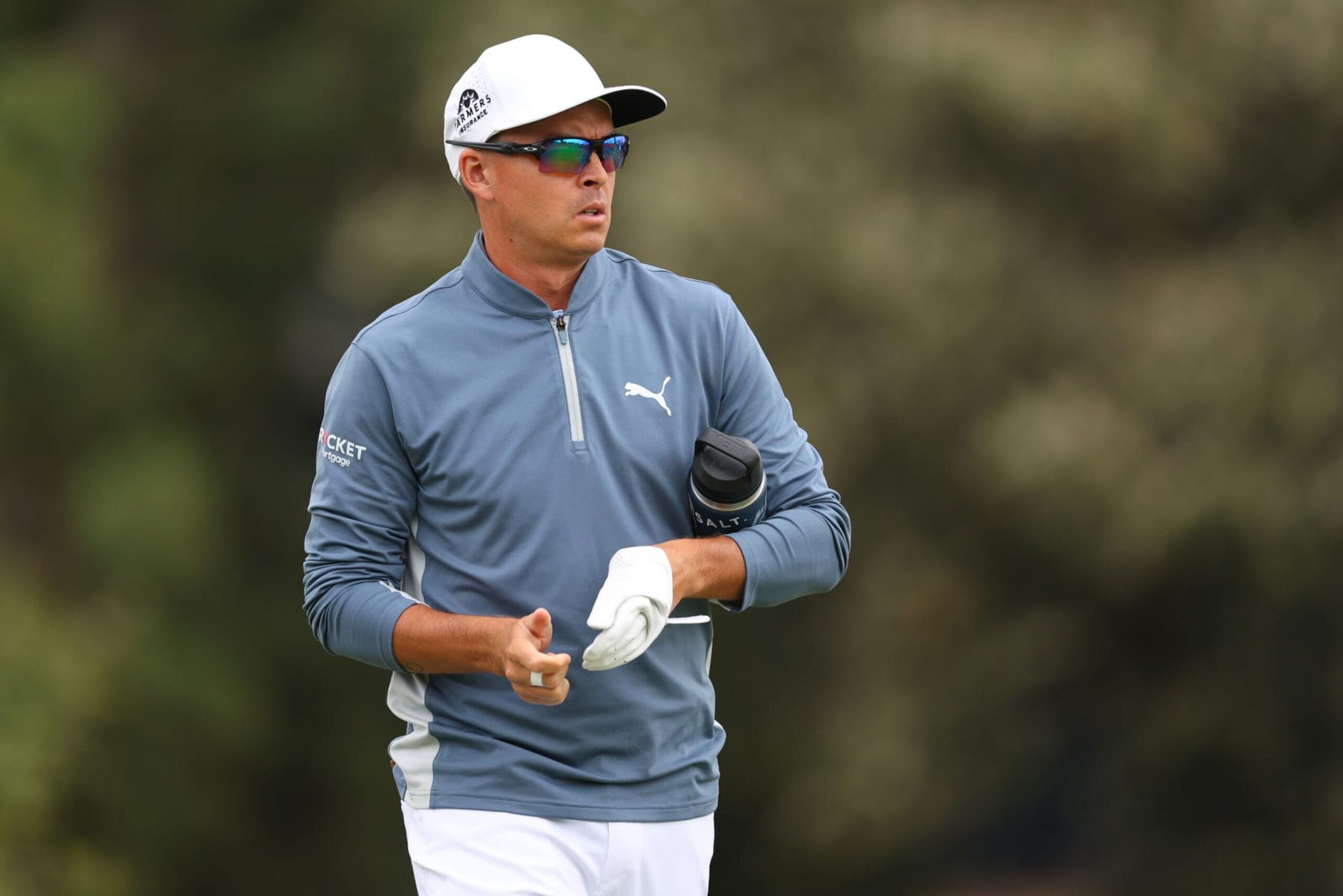 LOS ANGELES, CALIFORNIA - JUNE 15: Rickie Fowler of the United States walks from the 12th tee during the first round of the 123rd U.S. Open Championship at The Los Angeles Country Club on June 15, 2023 in Los Angeles, California. (Photo by Andrew Redington/Getty Images)