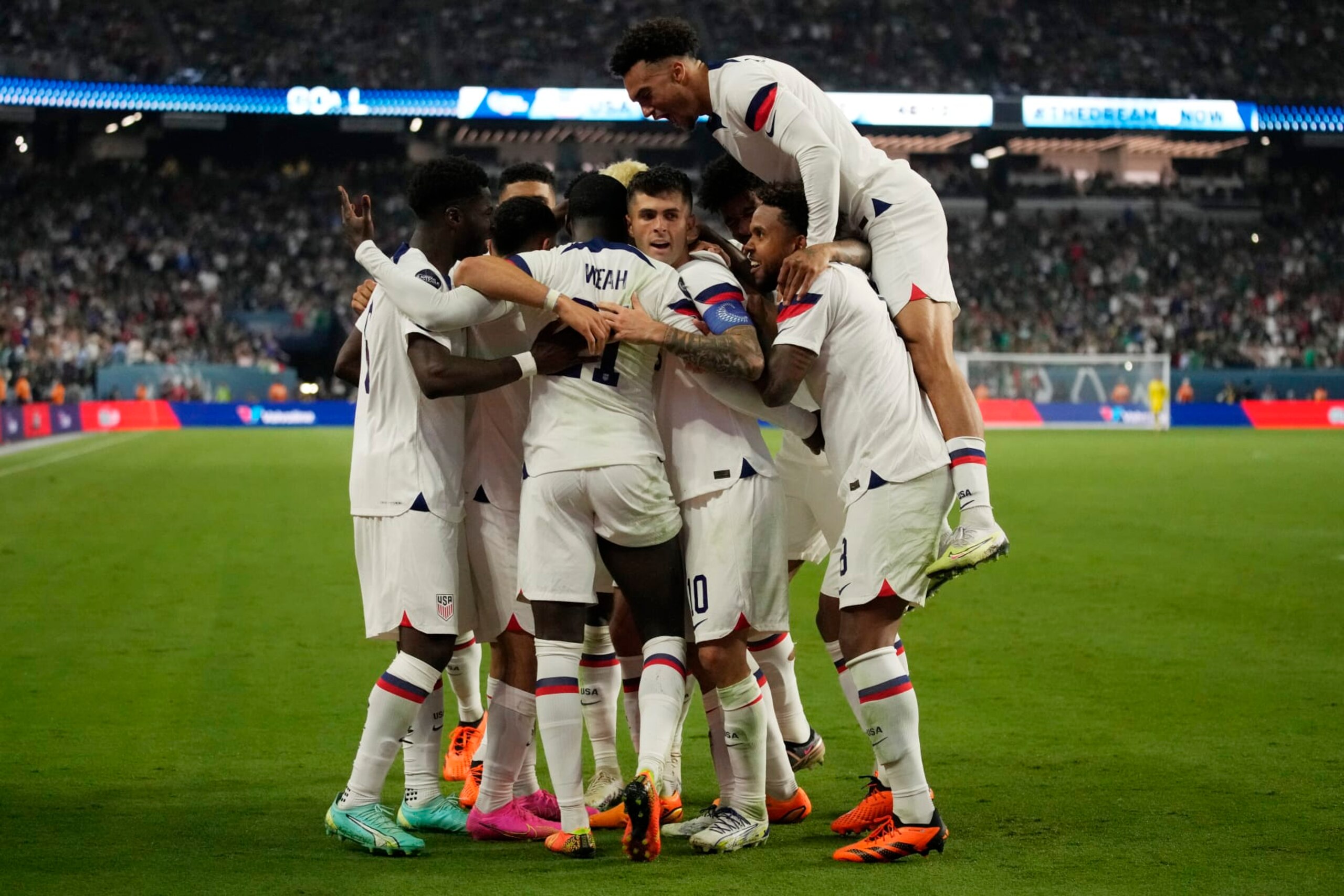 United States players celebrate a goal by Christian Pulisic (10) against Mexico during the second half of a CONCACAF Nations League semifinals soccer match Thursday, June 15, 2023, in Las Vegas. (AP Photo/John Locher) United States players celebrate a goal by Christian Pulisic (10) against Mexico during the second half of a CONCACAF Nations League semifinals soccer match Thursday, June 15, 2023, in Las Vegas. (AP Photo/John Locher)