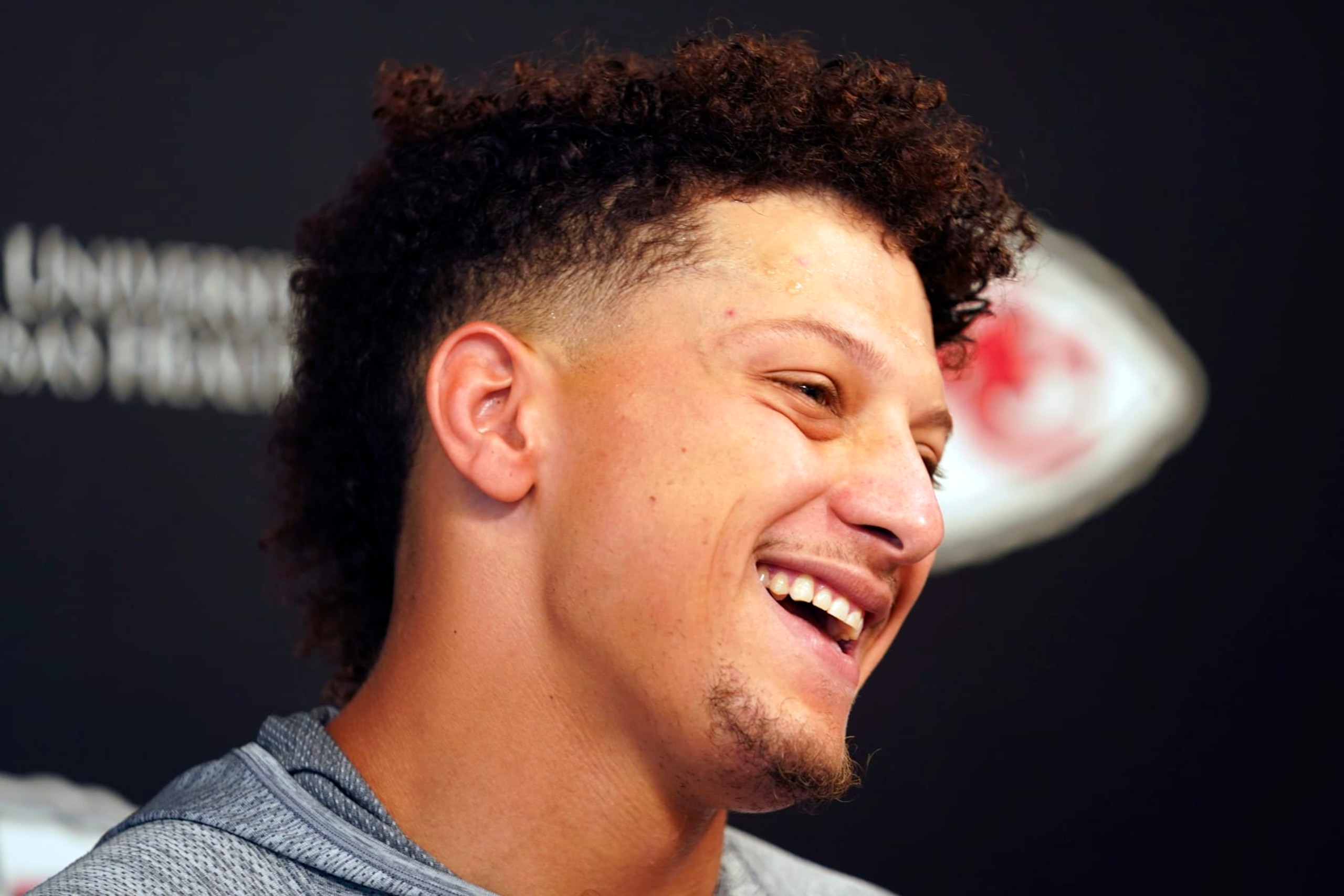 KANSAS CITY, MISSOURI - JUNE 15: Patrick Mahomes #15 of the Kansas City Chiefs speaks to the press during Chiefs Mini Camp on June 15, 2023 at Arrowhead Stadium in Kansas City, Missouri. (Photo by Kyle Rivas/Getty Images)