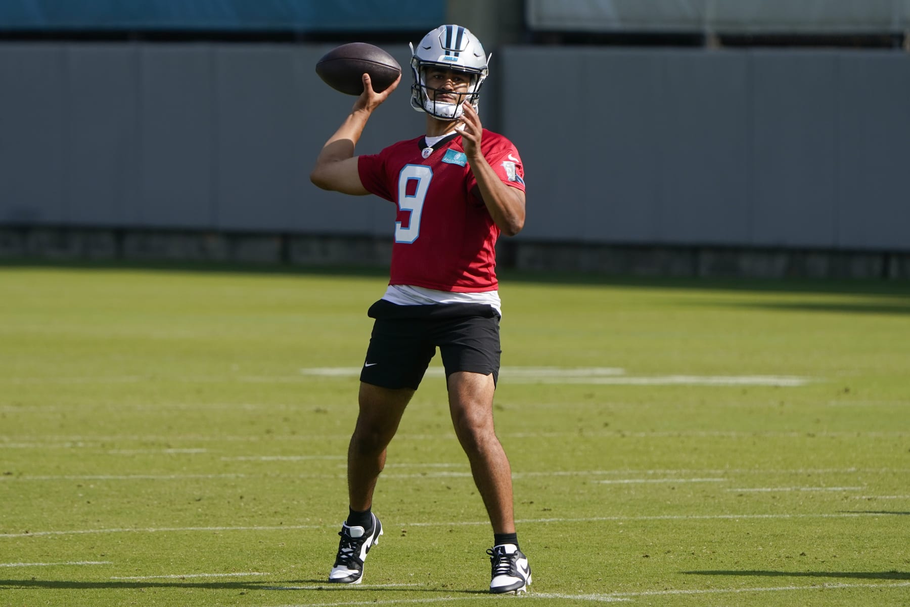 Carolina Panthers quarterback Bryce Young (9) throws a pass during NFL football practice, Thursday, June 1, 2023, in Charlotte, N.C. (AP Photo/Erik Verduzco)